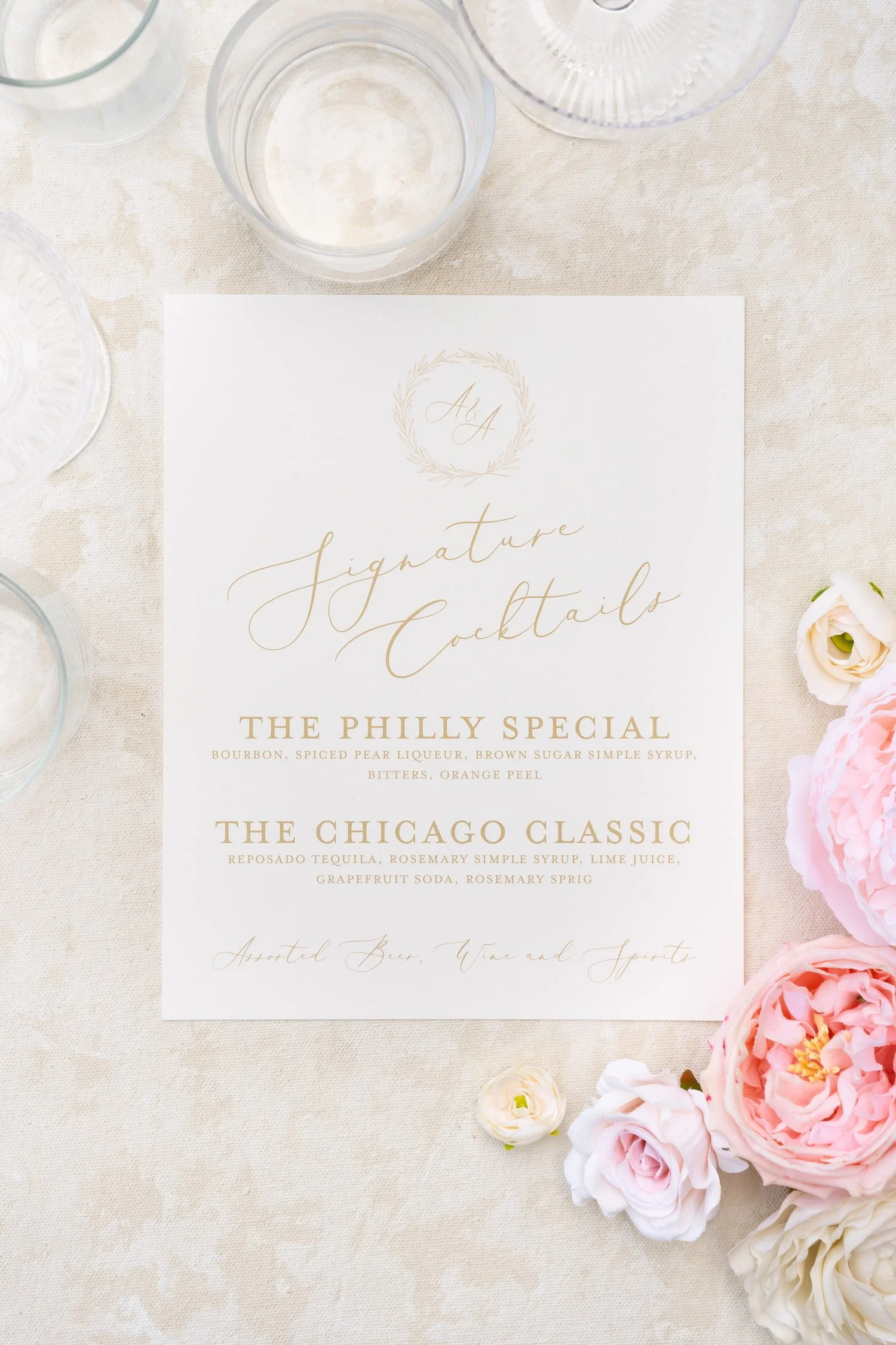 Luxury wedding stationery suite and signature cocktail signs in blush, ivory, and gold with delicate lace accents, hand-sewn embellishments, and romantic details created for a Chicago celebration blending Korean and American heritage.