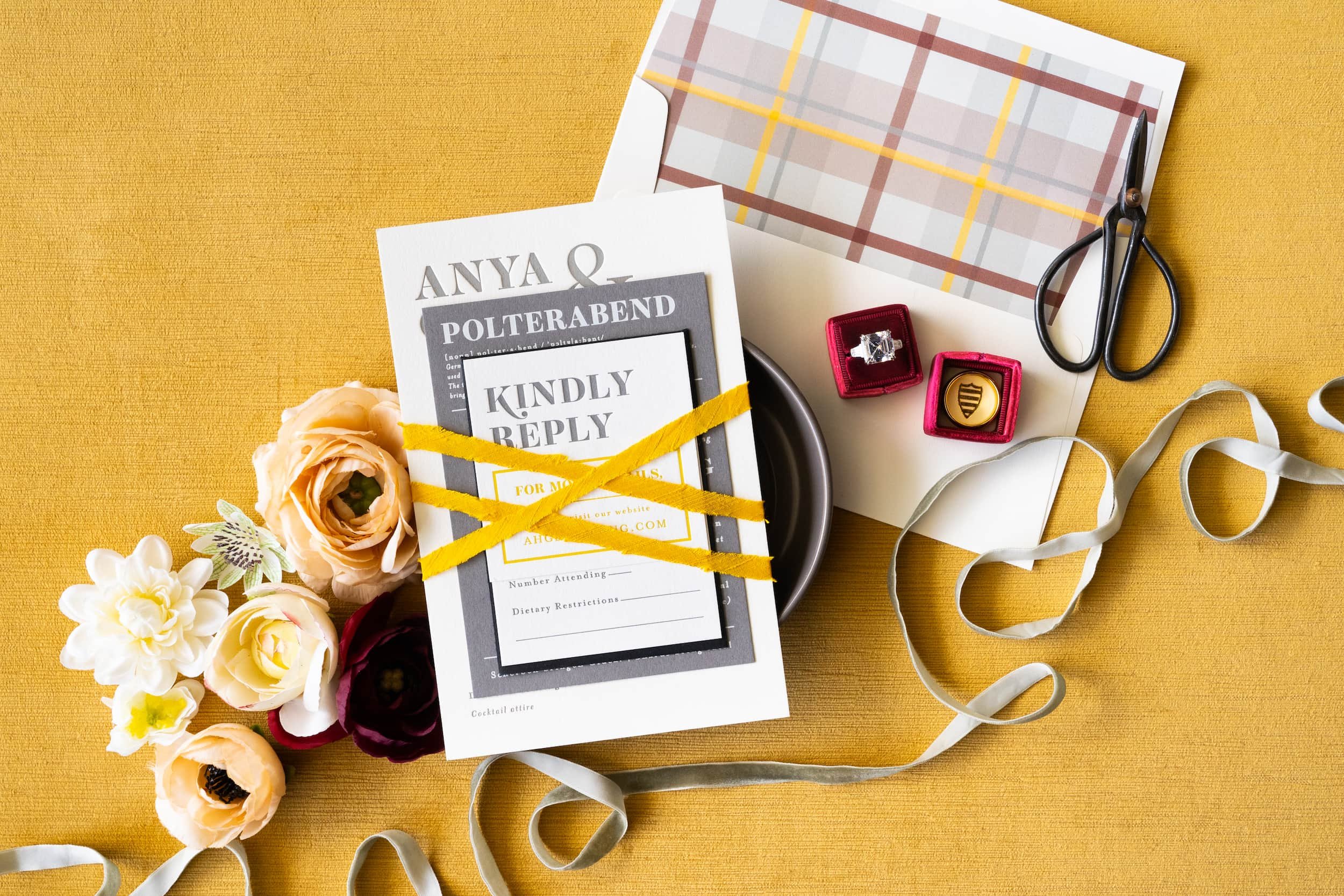Modern Denver wedding invitation suite with bold typography, plaid envelope liner, foil stamping, and custom monogram postage for an autumn celebration.