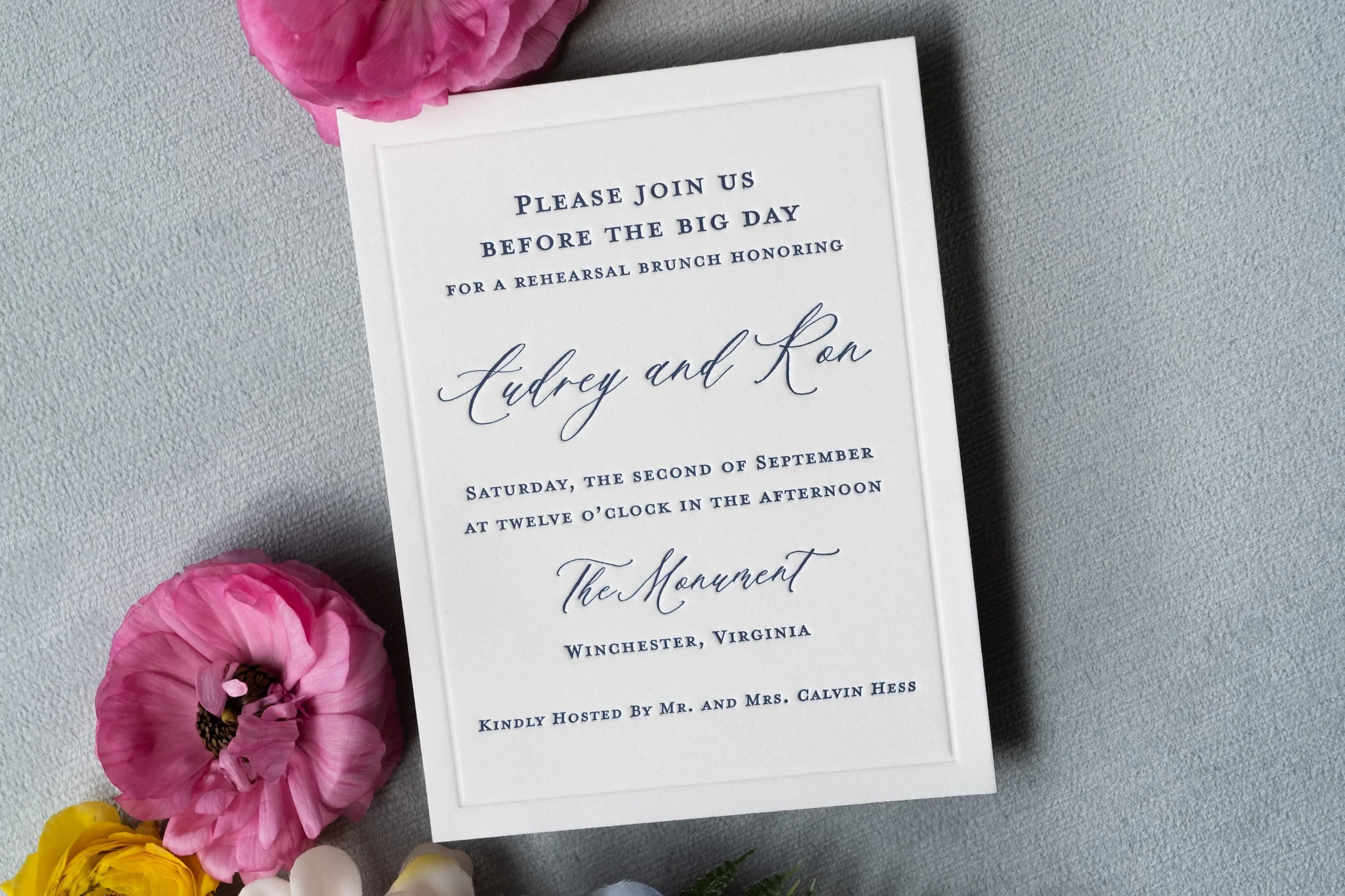 Comprehensive luxury wedding paper story showcasing engagement party invitations, save the dates, wedding invitations, and day-of details with letterpress, blind debossing, edge painting, and custom crest design.