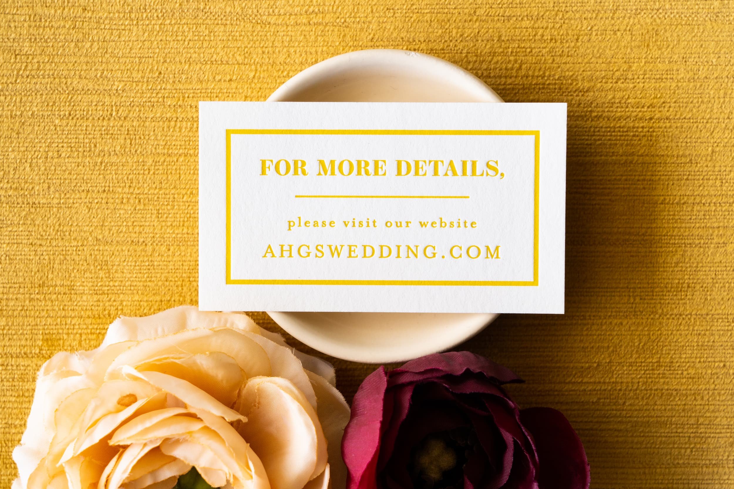 Luxury letterpress and foil wedding invitation suite for a September wedding at Kimpton Hotel Born featuring gray, harvest gold, burgundy, and black-and-white details inspired by the city of Denver.