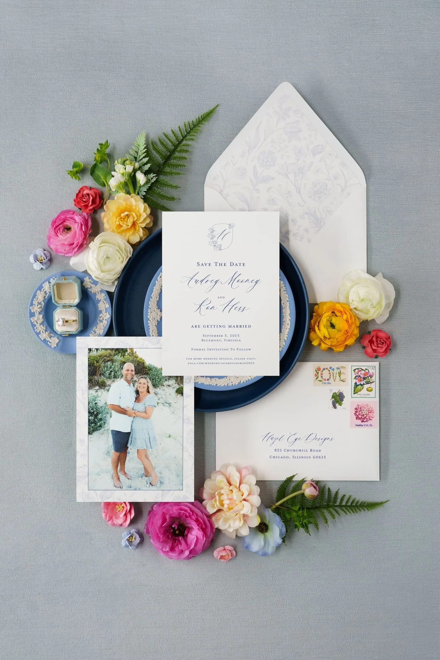 Sophisticated wedding invitation suite and event stationery featuring custom wax seals, floral crest illustrations, letterpress printing, and refined details inspired by a romantic Virginia vineyard celebration.