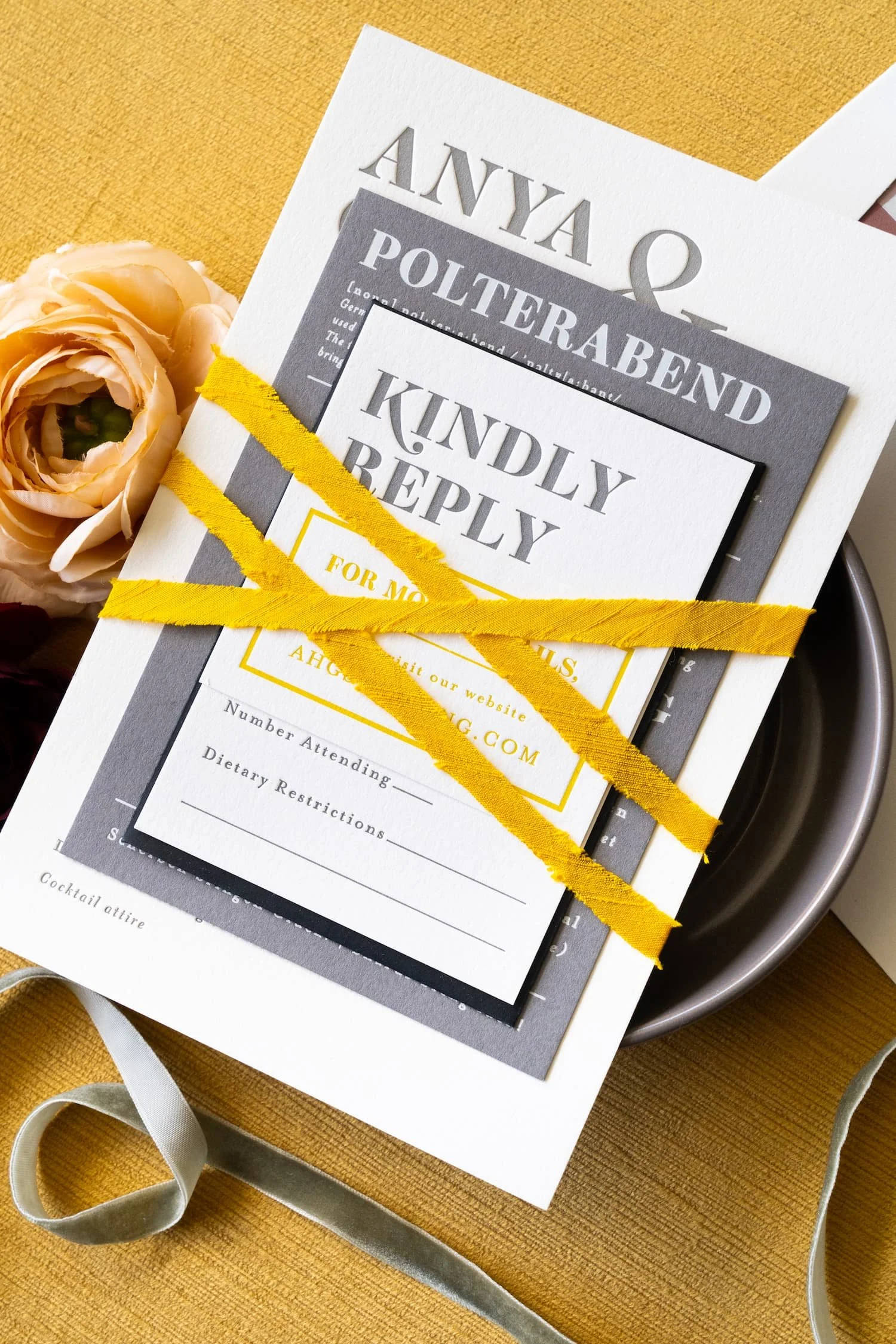 Modern Denver wedding invitation suite with bold typography, plaid envelope liner, foil stamping, and custom monogram postage for an autumn celebration.