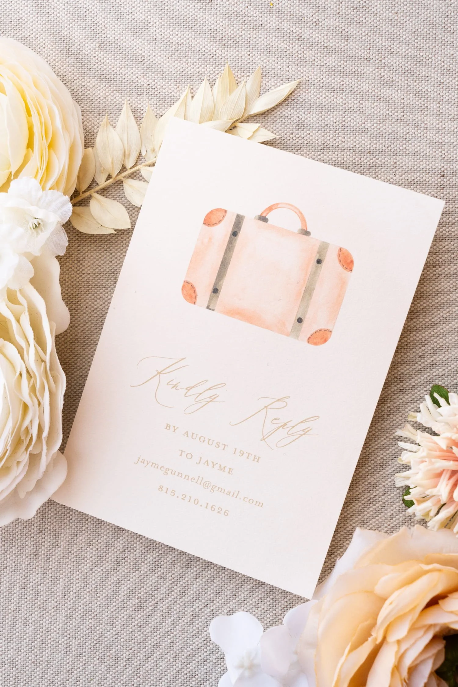 Adventure-inspired baby shower reply card with soft peach and sage watercolor details, clean modern typography, and coordinating travel-themed stationery design.