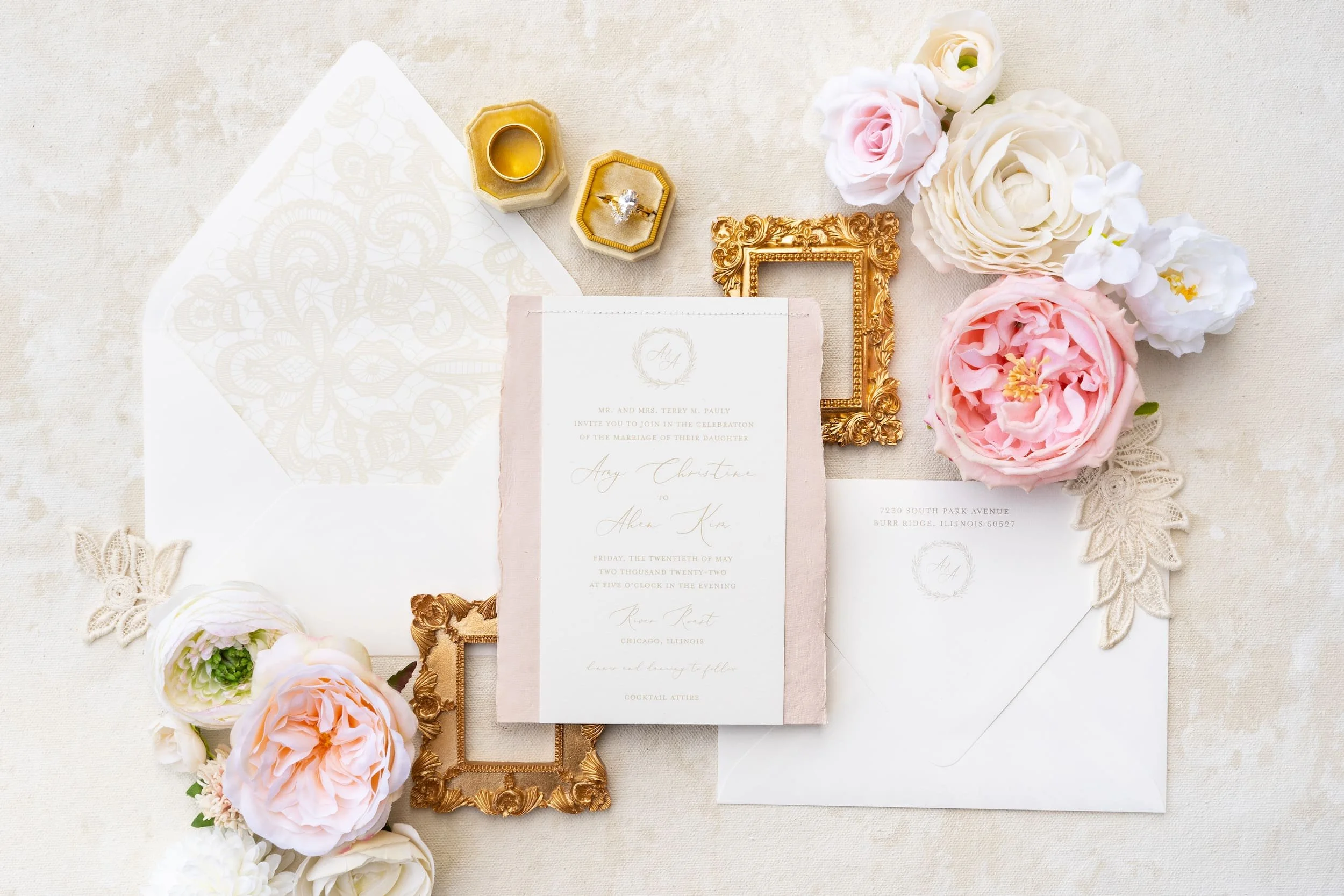 Elegant Chicago wedding invitation suite featuring soft blush and ivory tones, gold foil accents, hand-sewn lace details, and refined nods to both Korean and American traditions.