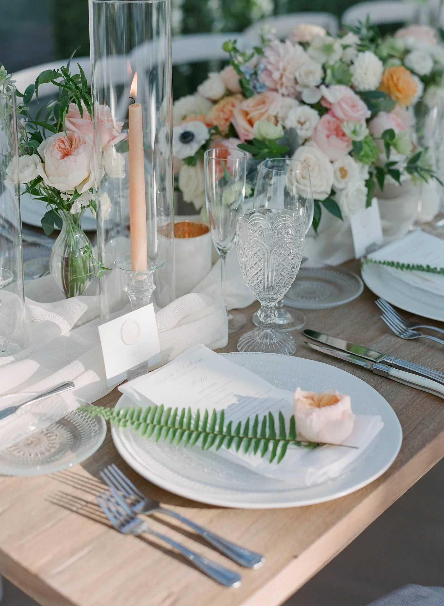 Wedding menus finished with custom wax seals in different colors to indicate guests' meal selections while complementing the overall invitation suite.