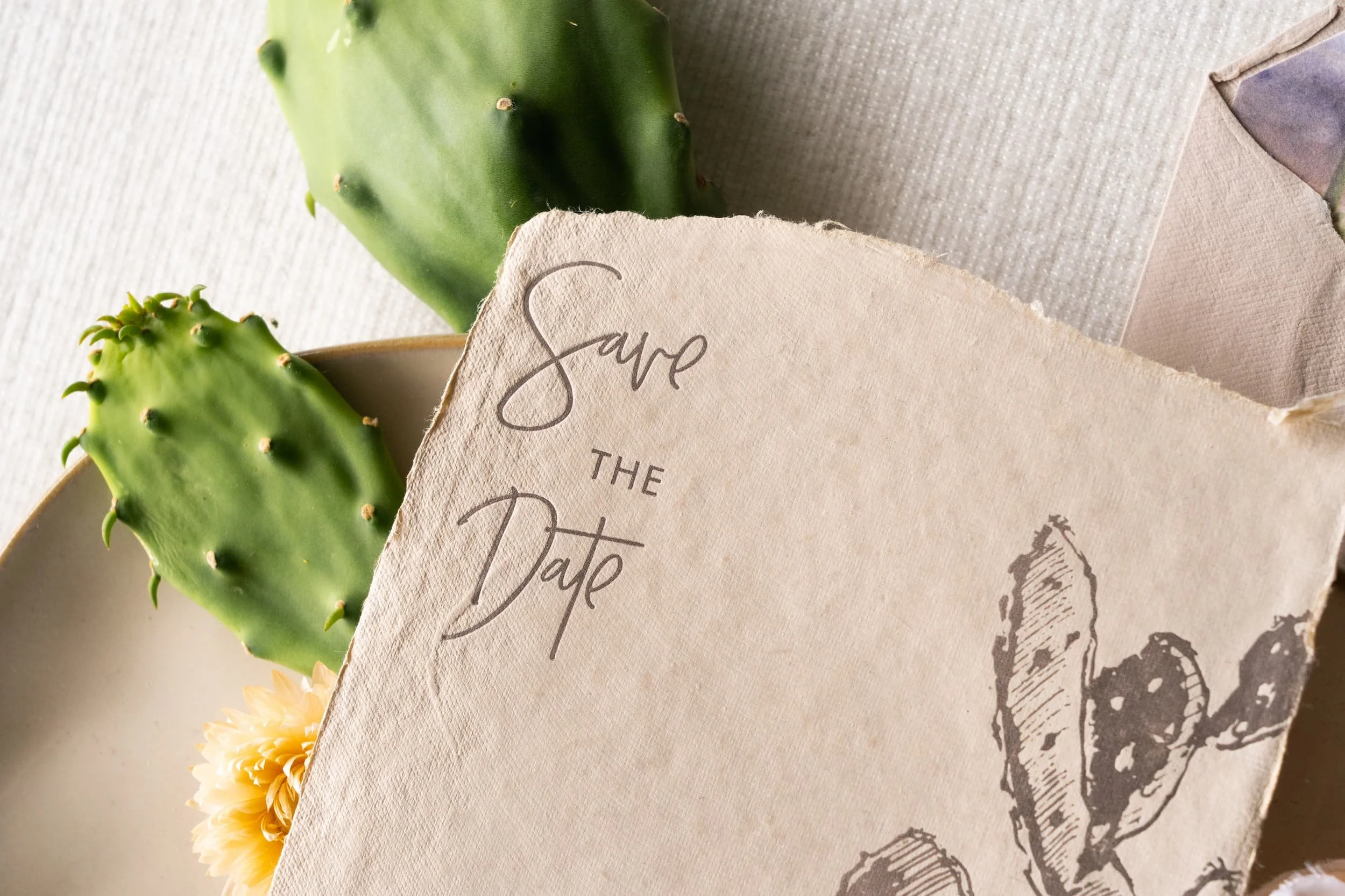 Luxury desert wedding save the date suite letterpressed on handmade paper for a romantic Four Seasons Resort Scottsdale at Troon North celebration inspired by the Arizona landscape.