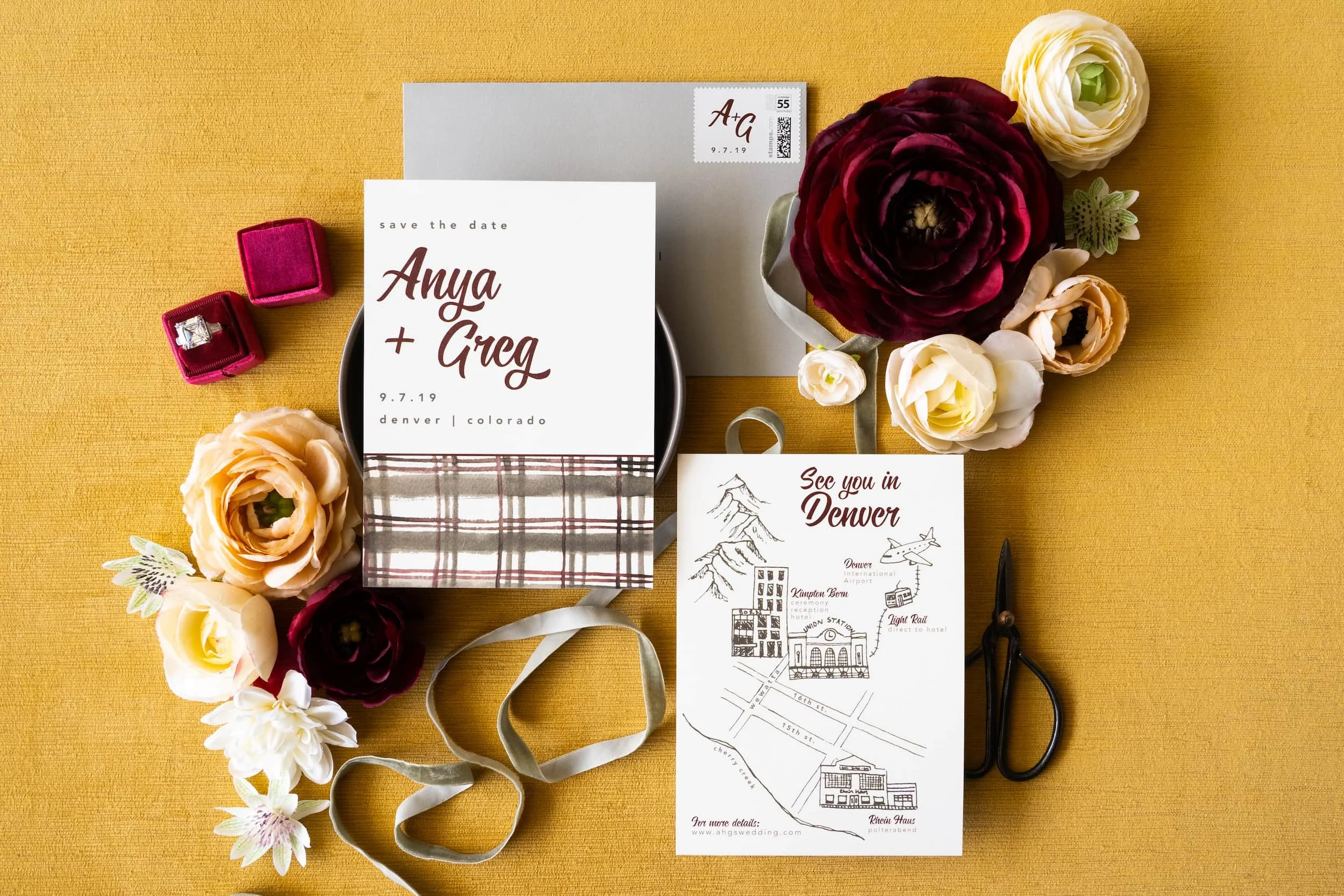 Modern Denver save the date suite with bold typography, plaid envelope liner, foil stamping, and custom monogram postage for an autumn celebration.