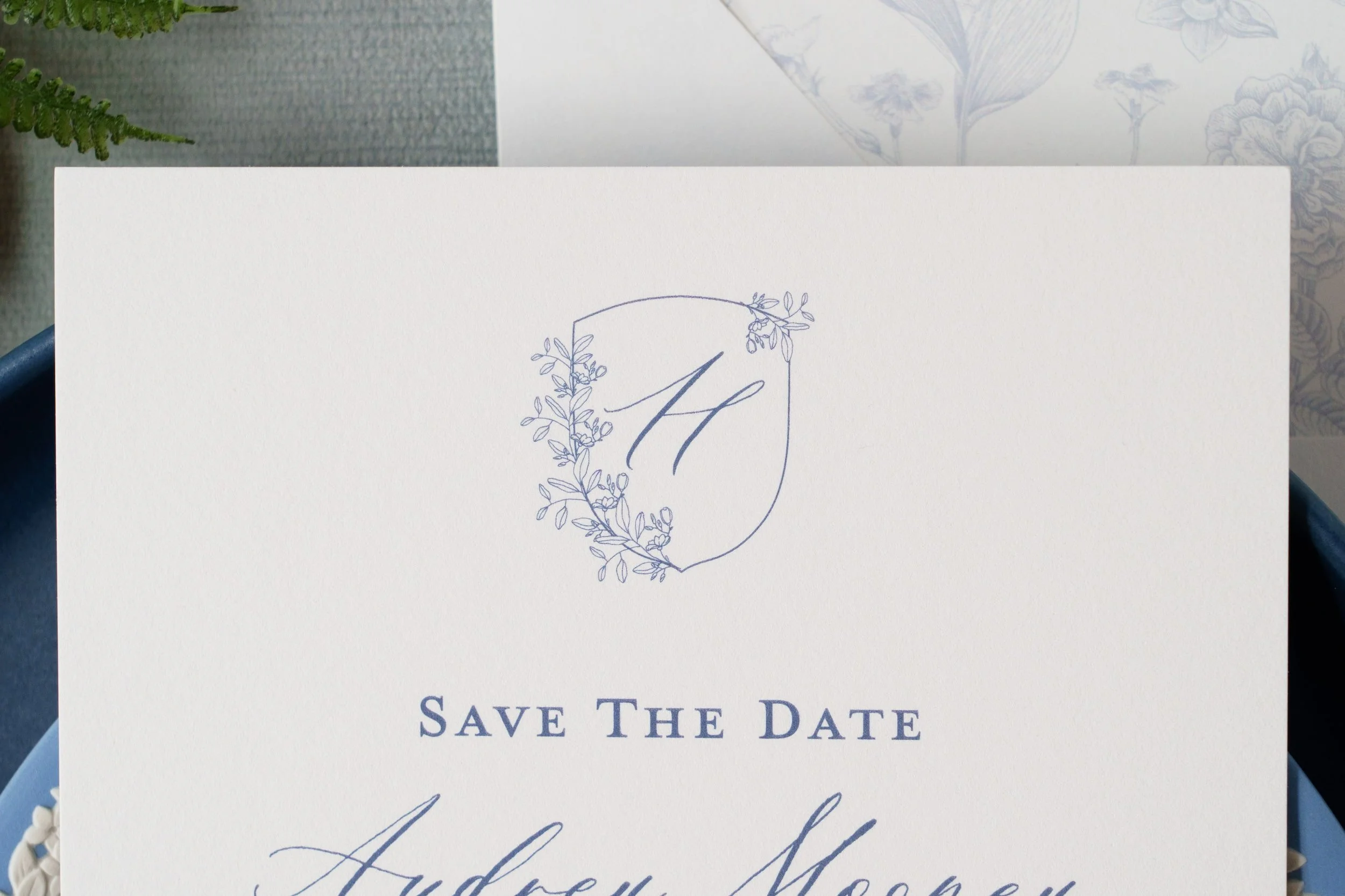 Sophisticated wedding invitation suite and event stationery featuring custom wax seals, floral crest illustrations, letterpress printing, and refined details inspired by a romantic Virginia vineyard celebration.