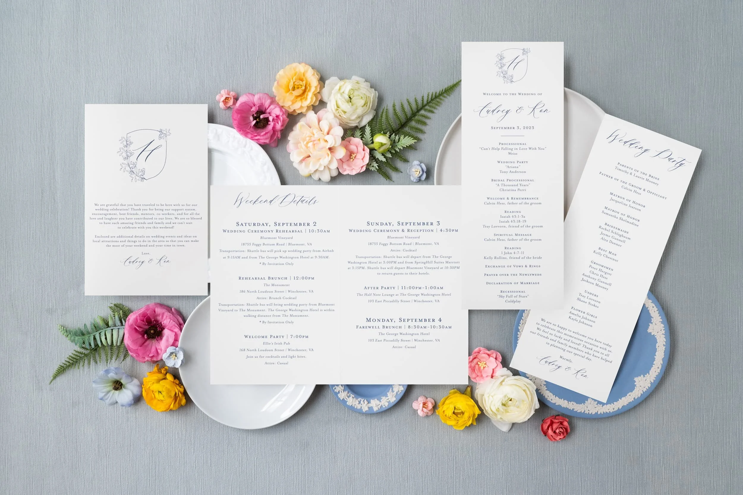 Comprehensive luxury wedding paper story showcasing engagement party invitations, save the dates, wedding invitations, and day-of details with letterpress, blind debossing, edge painting, and custom crest design.