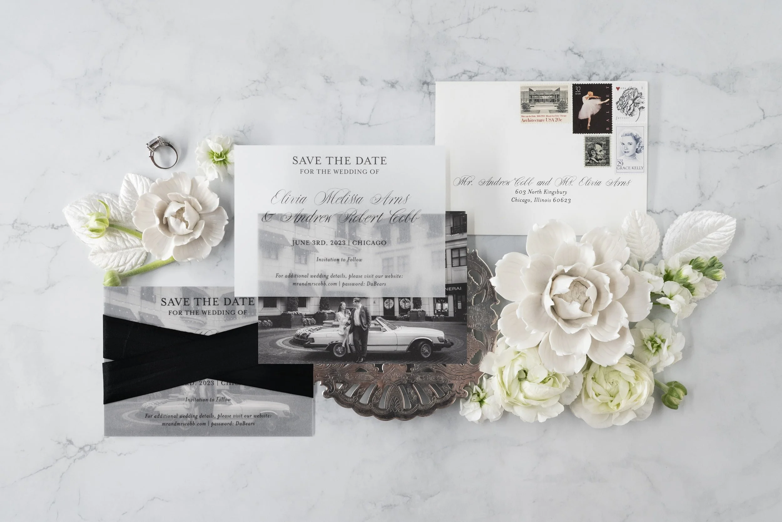 Luxury black-and-white wedding invitation suite with double-thick cotton cardstock, black edge painting, silk ribbon, and vintage postage inspired by old Chicago elegance.