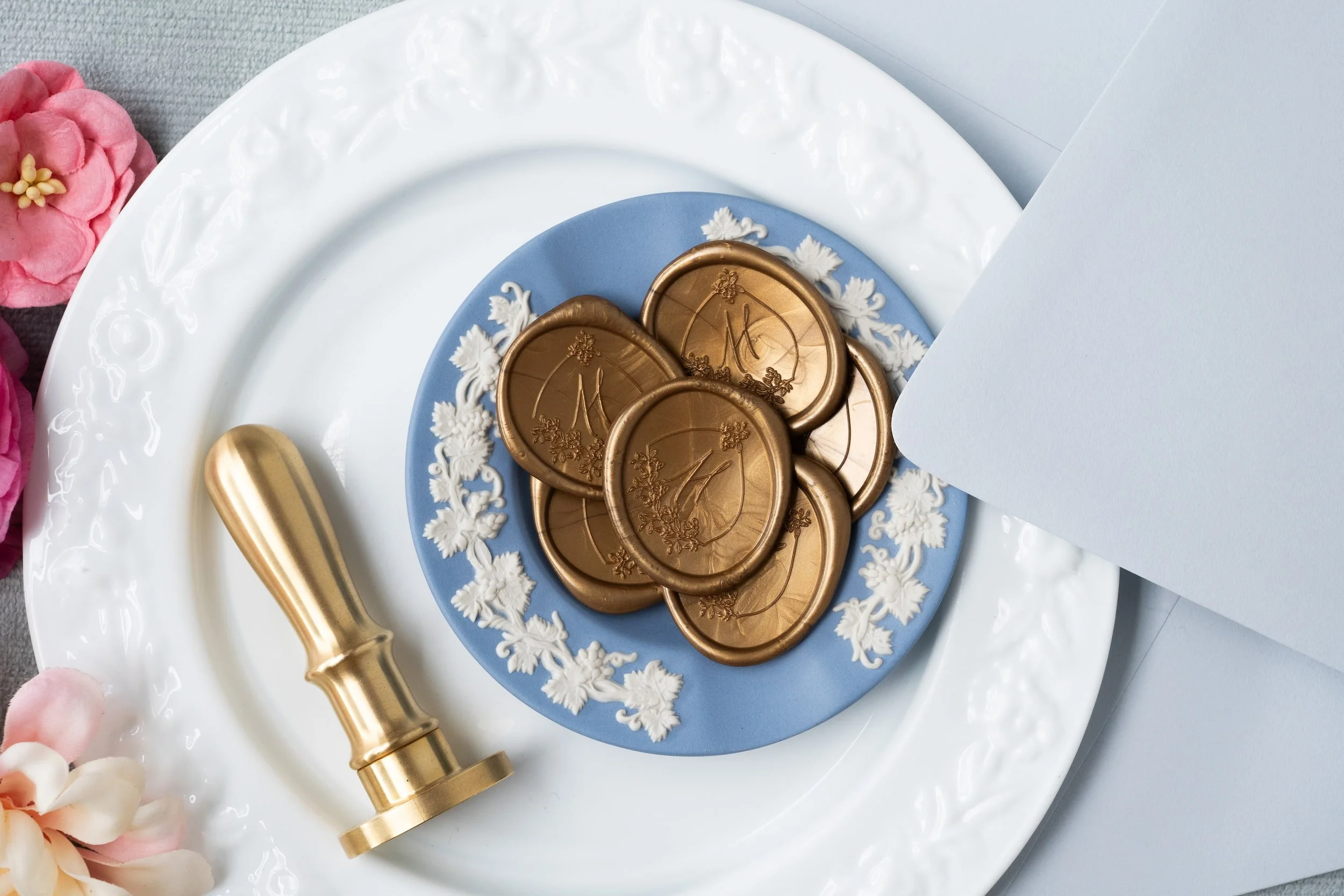 Sophisticated wedding invitation suite and event stationery featuring custom wax seals, floral crest illustrations, letterpress printing, and refined details inspired by a romantic Virginia vineyard celebration.
