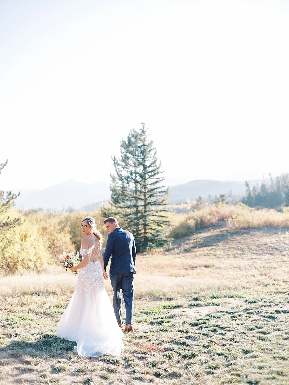 Bride and groom at wedding at Whispering River Ranch in Breckenridge, Colorado