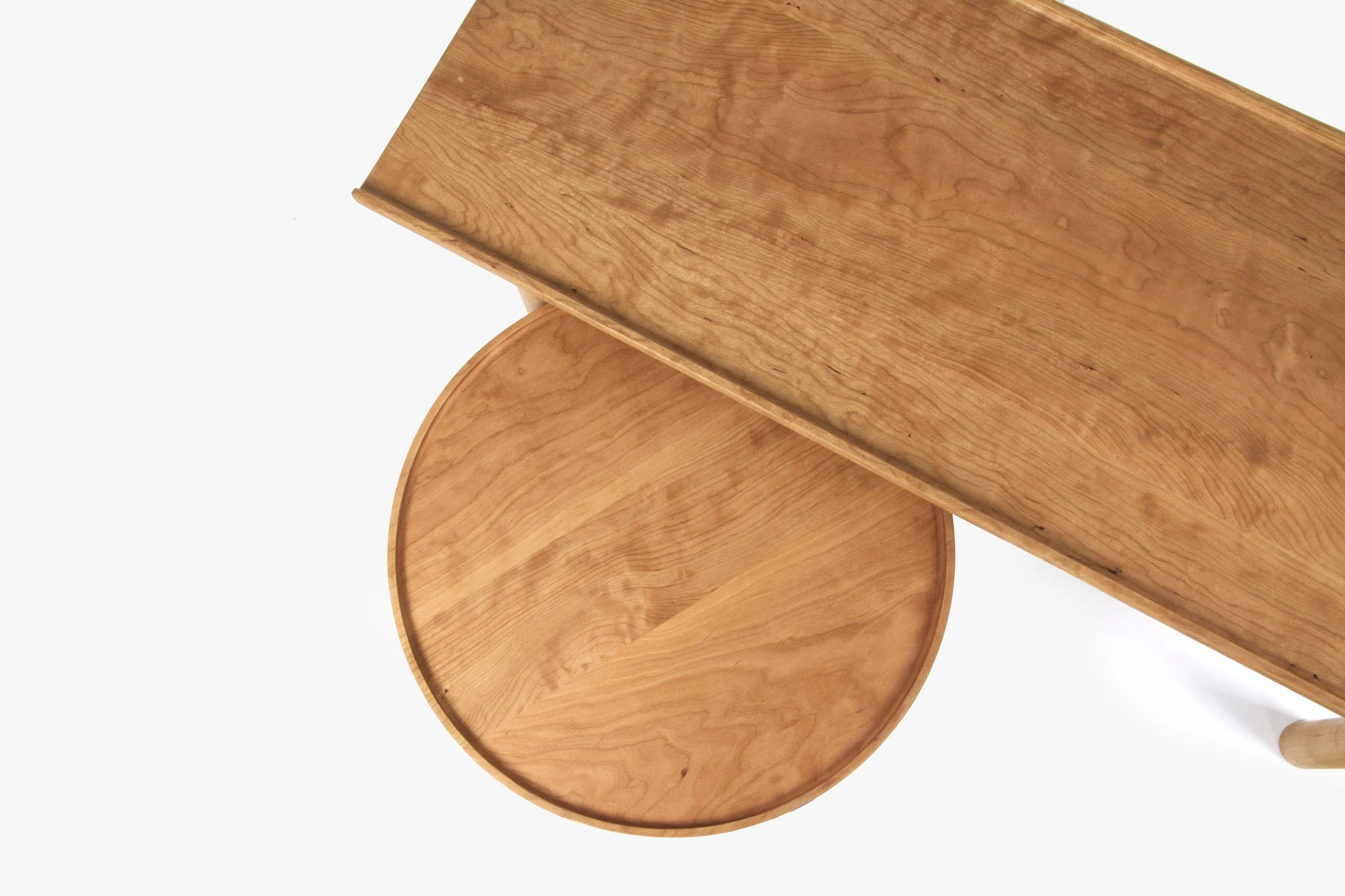  A moraine is the edge or terminus carved by a glacier. The Moraine Series, available in different heights and primary shapes, is defined by a subtle lip which is both distinct and practical. Manufactured in Chicago and distributed by 57th St. Design