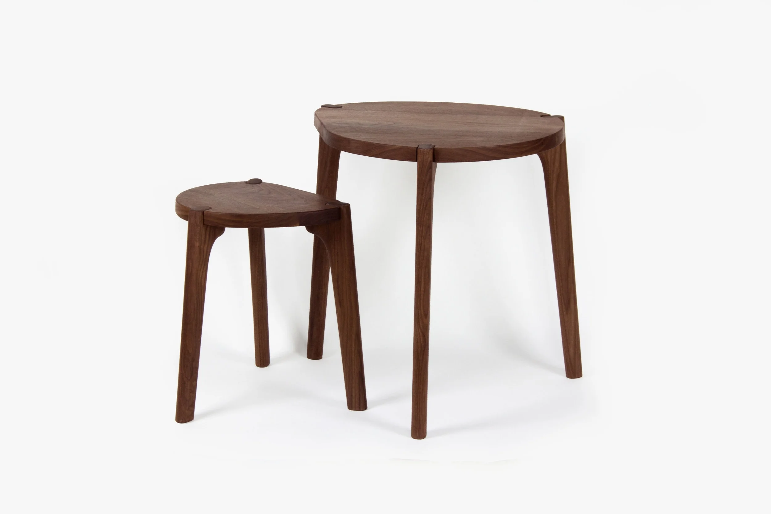  The Tangent Tables are a unique furniture expression. Merging the structural apron with the leg, the tables are minimal yet dynamic. Manufactured in Chicago and distributed by 57th St. Design. 