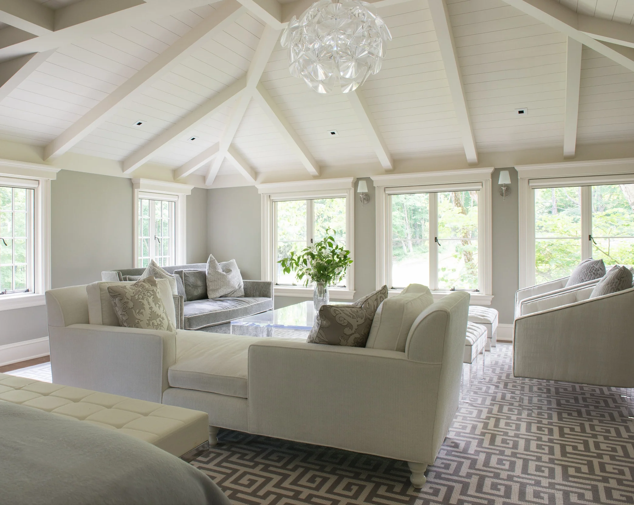 Bright Sitting Room with Vaulted Ceiling