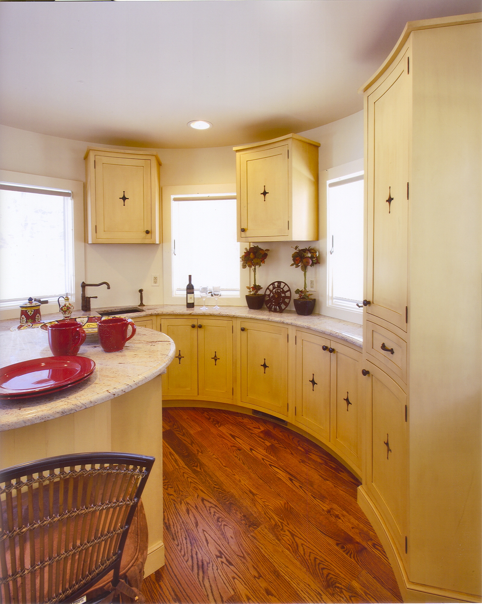 Custom Curved Cabinetry with Center Island