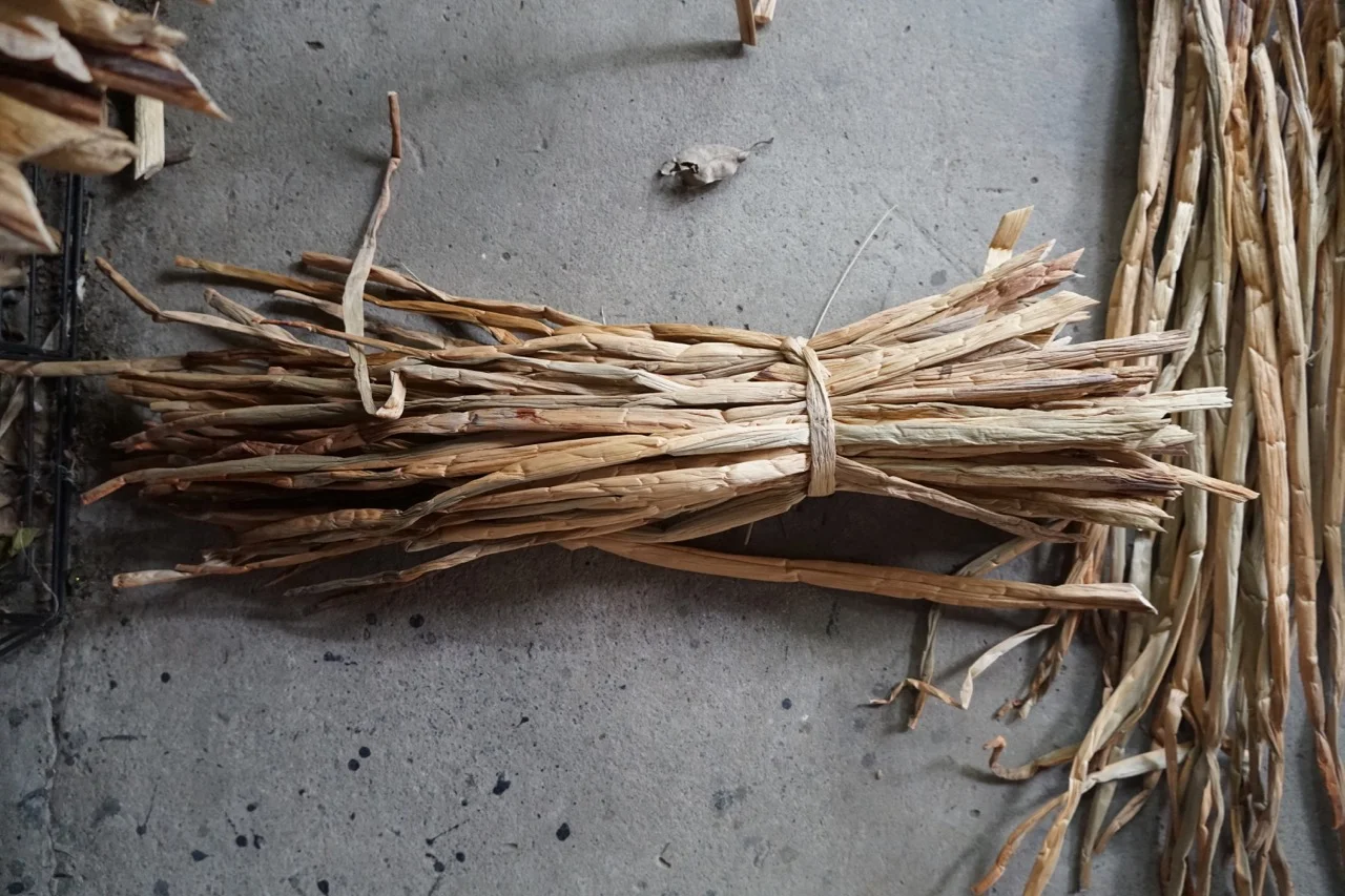 At Naturecraft, water hyacinth which is grown by women in the Mekong Delta is woven and often dyed into homeware designs.