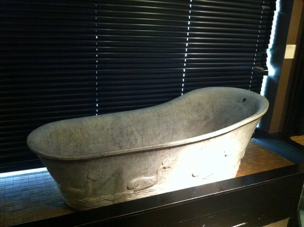 The majority of modern bathtubs have the same form and functionality as this 2000-year old exhibit. This shape represents the dominant design for bathtubs.