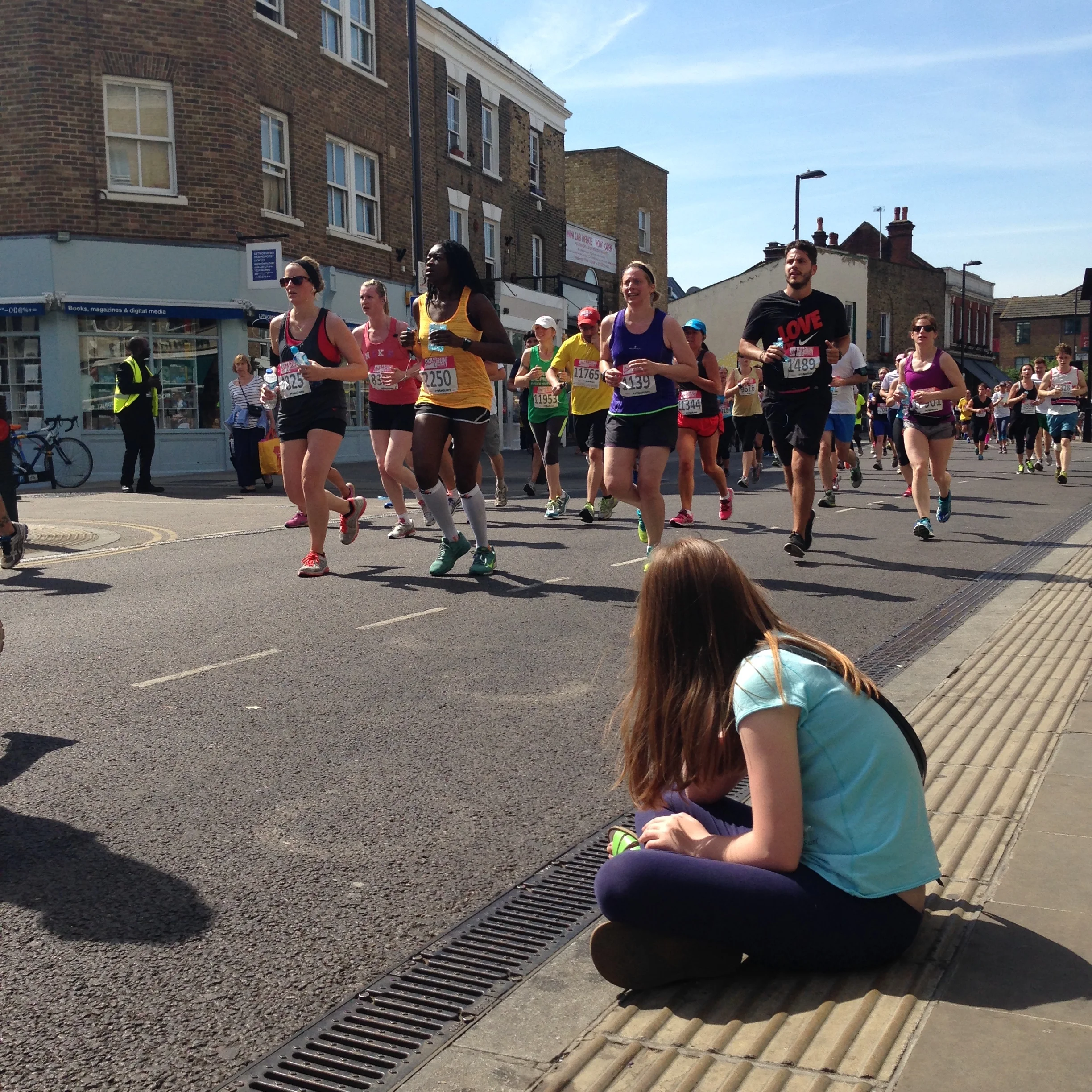 Runners on Broadway Market in the Hackney Half marathon, which returns in May.