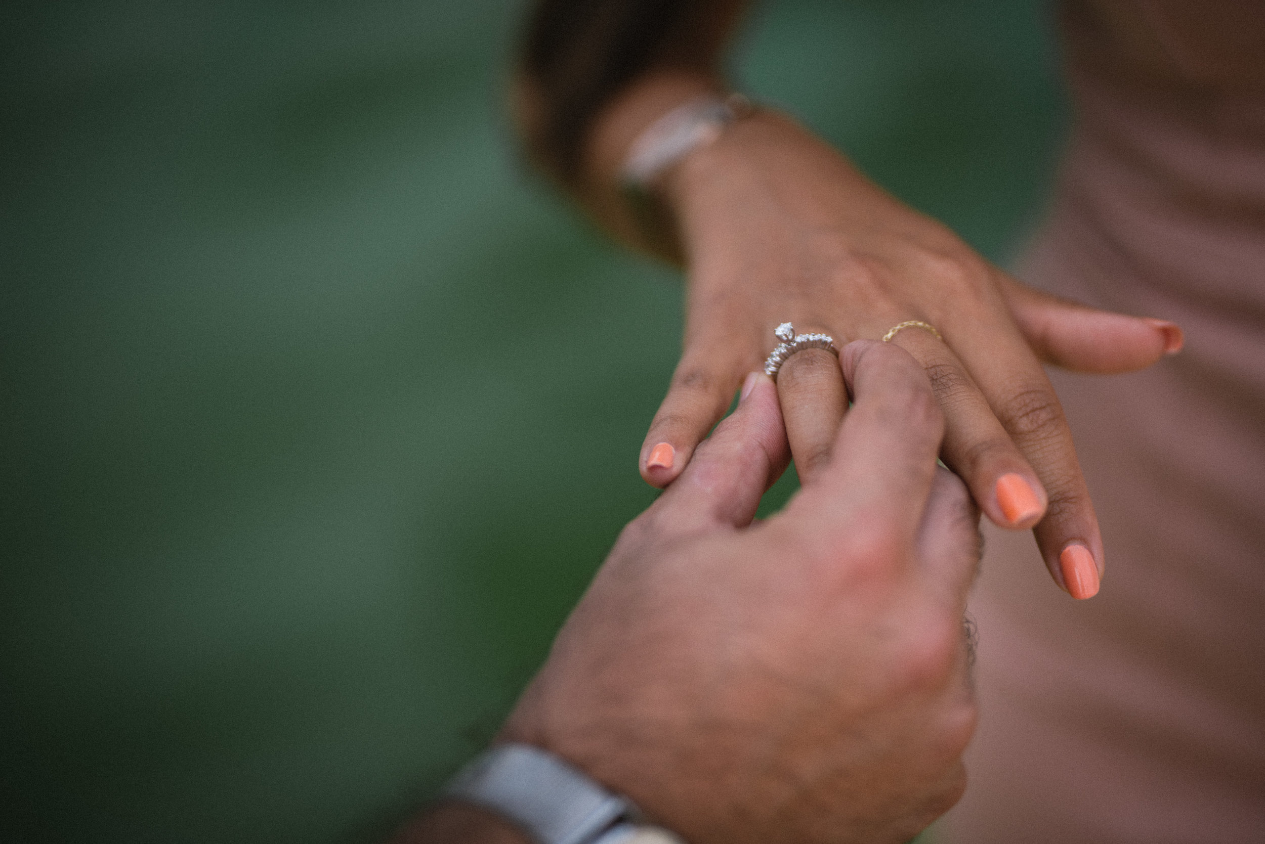 So he puts the ring on her finger