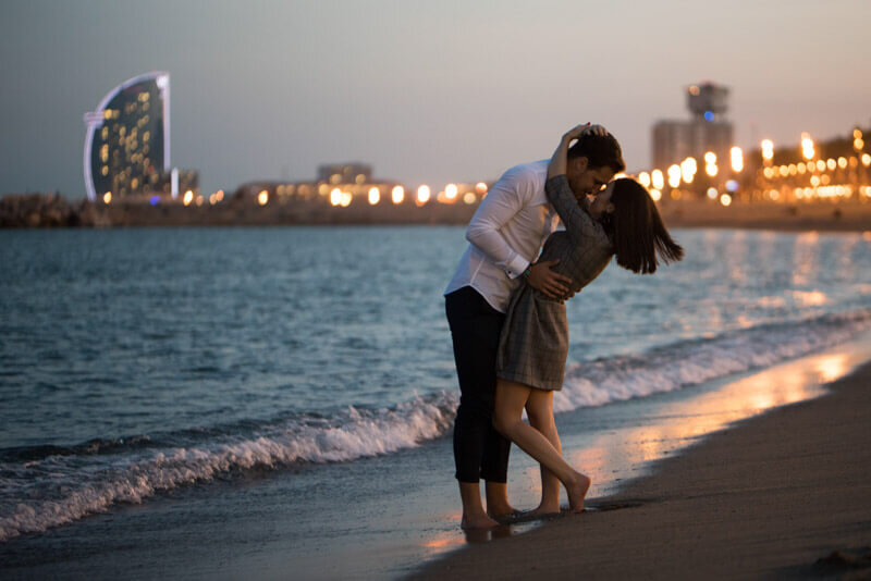 Young couple after sunset Barcelona Beach with W-Hotel