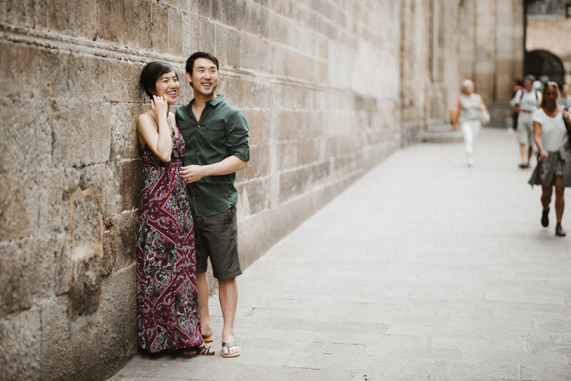 Asian couple standing gothic quarter
