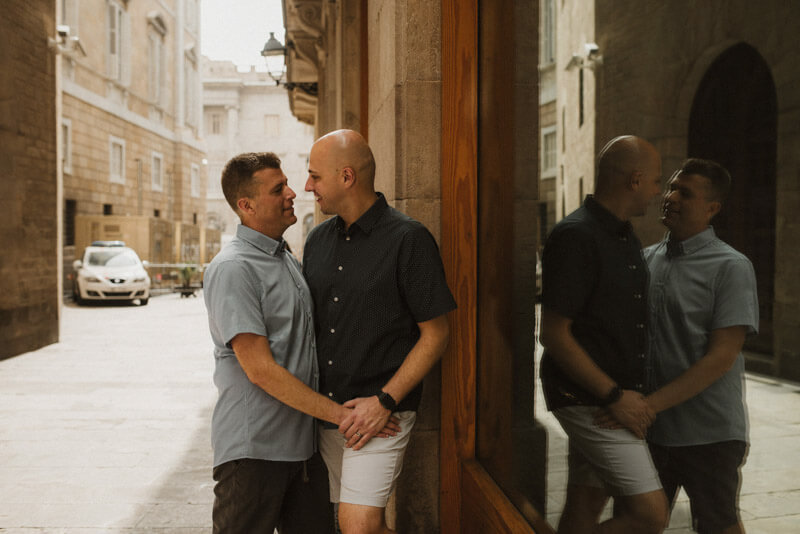 Gay couple reflection Barcelona Gothic Quarter