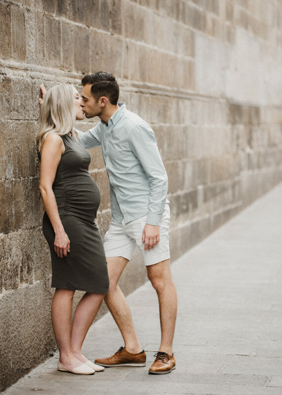 Couple with pregnant wife Barcelona gothic quarter