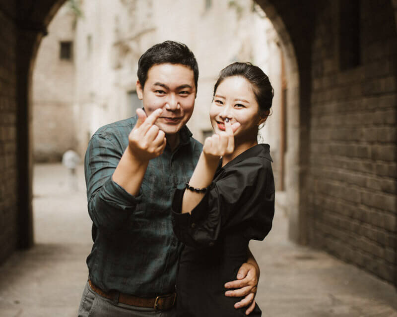 Asian couple hand gesture Finger heart