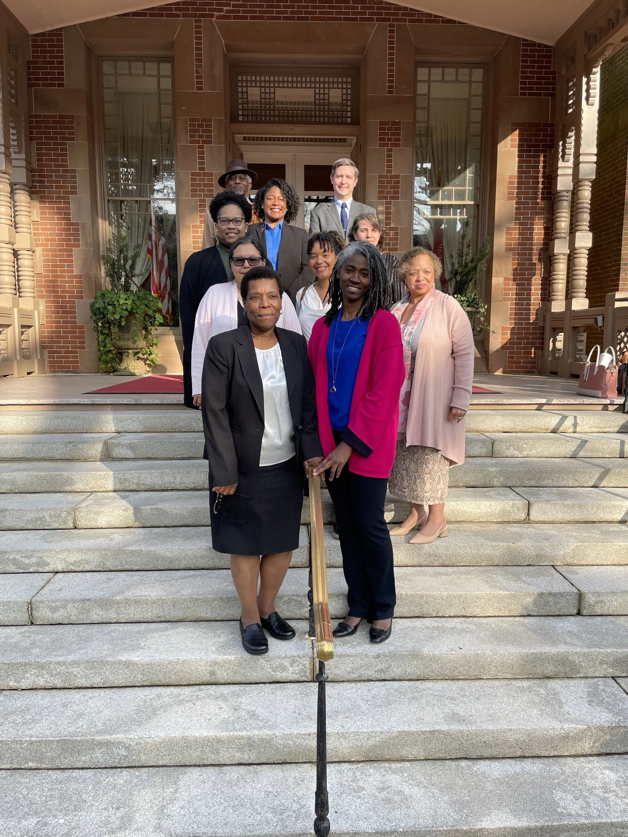 Exec. Director Devon Hall meets with NC Governor Cooper 