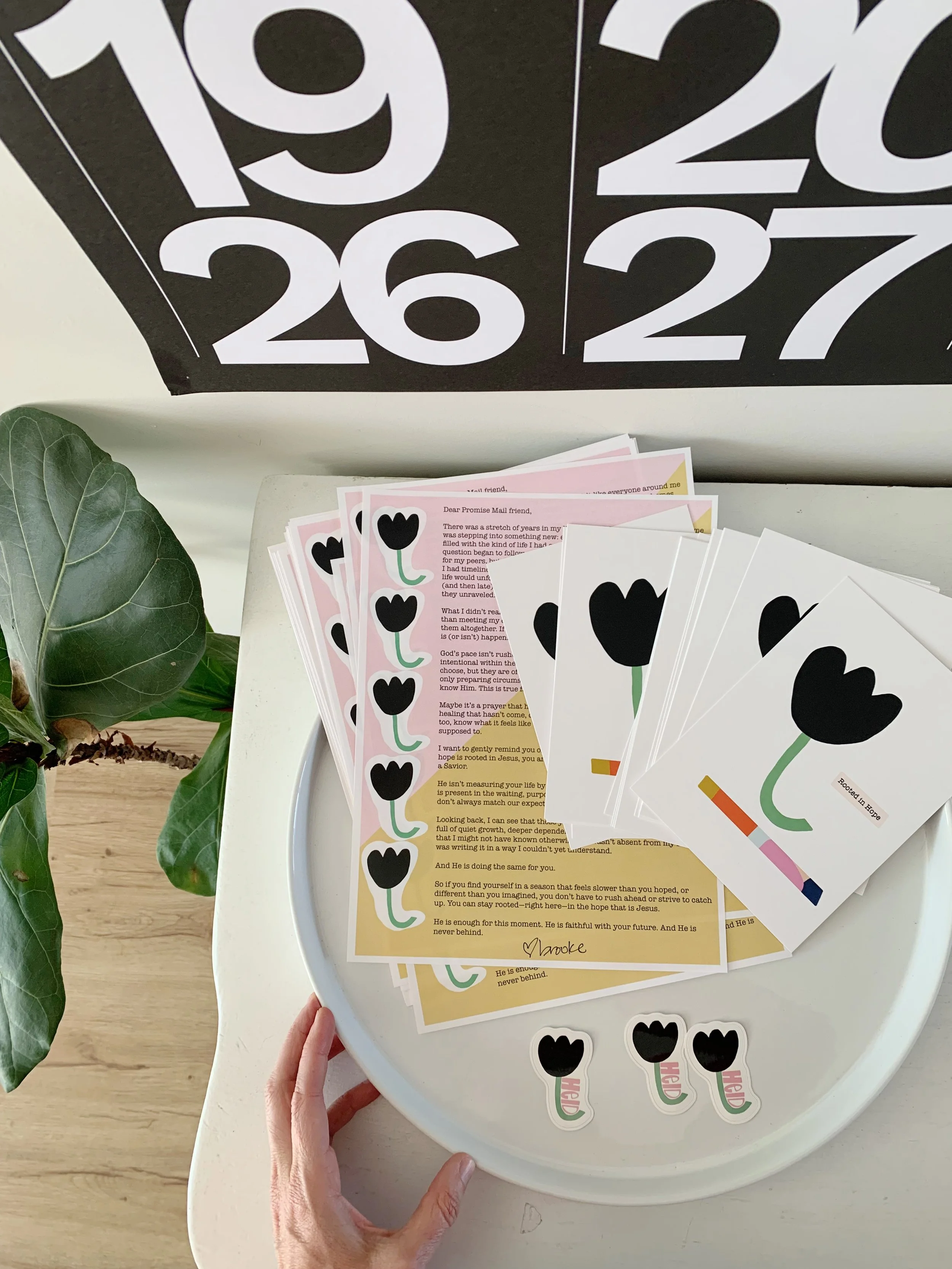 Snail Mail components - art print, letter, and sticker featuring "rooted in hope"