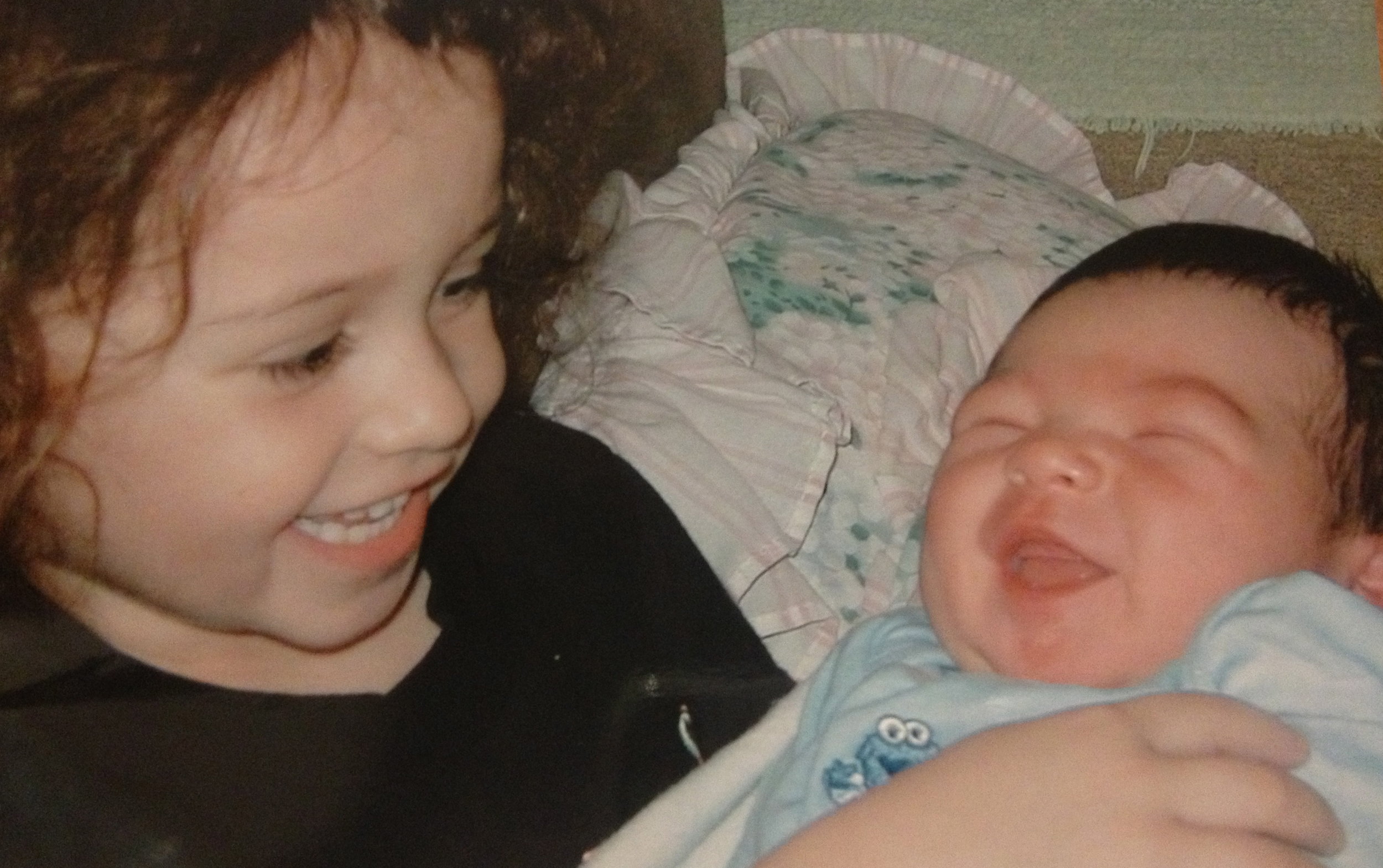 He was only a week old when I took this picture. He hasn’t stopped smiling.