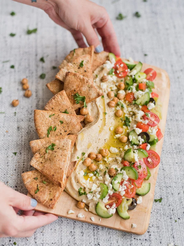 serving-greek-hummus-board-for-summer.jpg