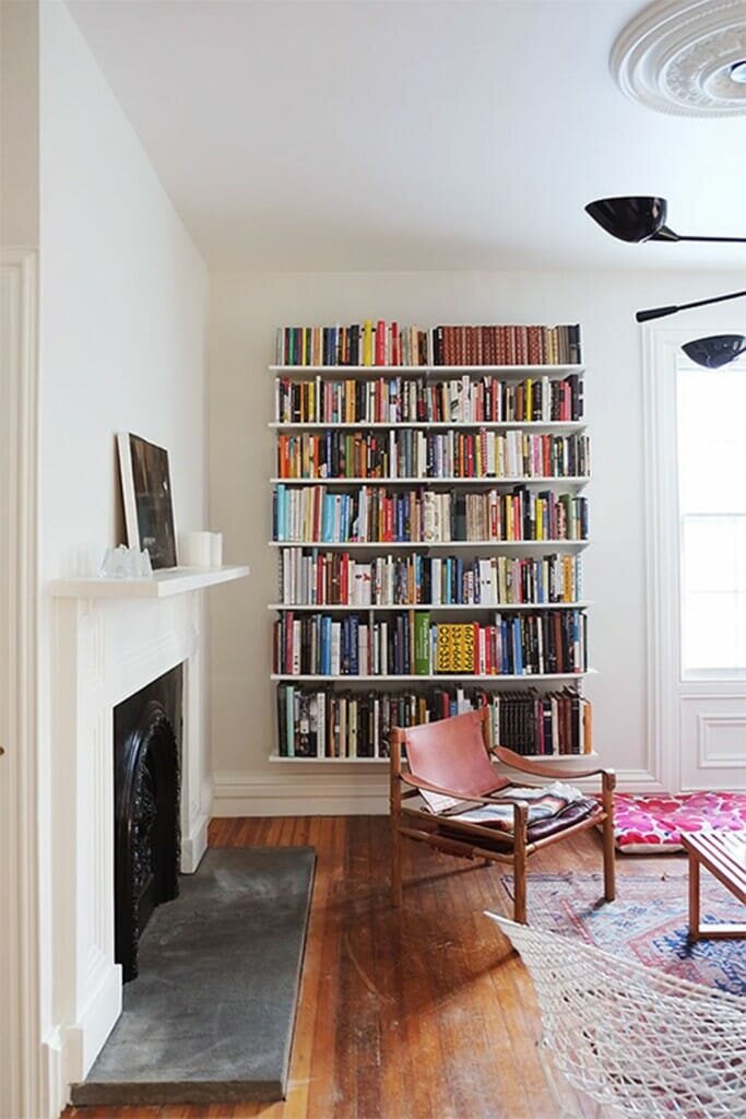 Wall-of-Bookshelves-and-5-other-ways-to-decorate-a-big-wall-683x1024.jpg