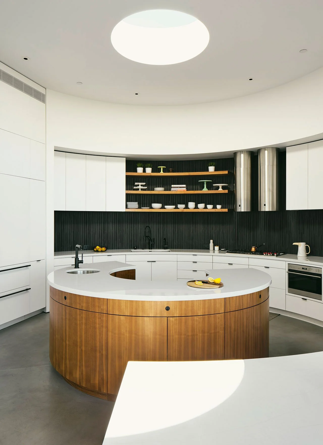 1960s architecture, 1960s house, large kitchen, circular kitchen, kitchen, centre-of-the-house kitchen, kitchen inspiration, central kitchen, architectural, architecture, curves, light, windows 