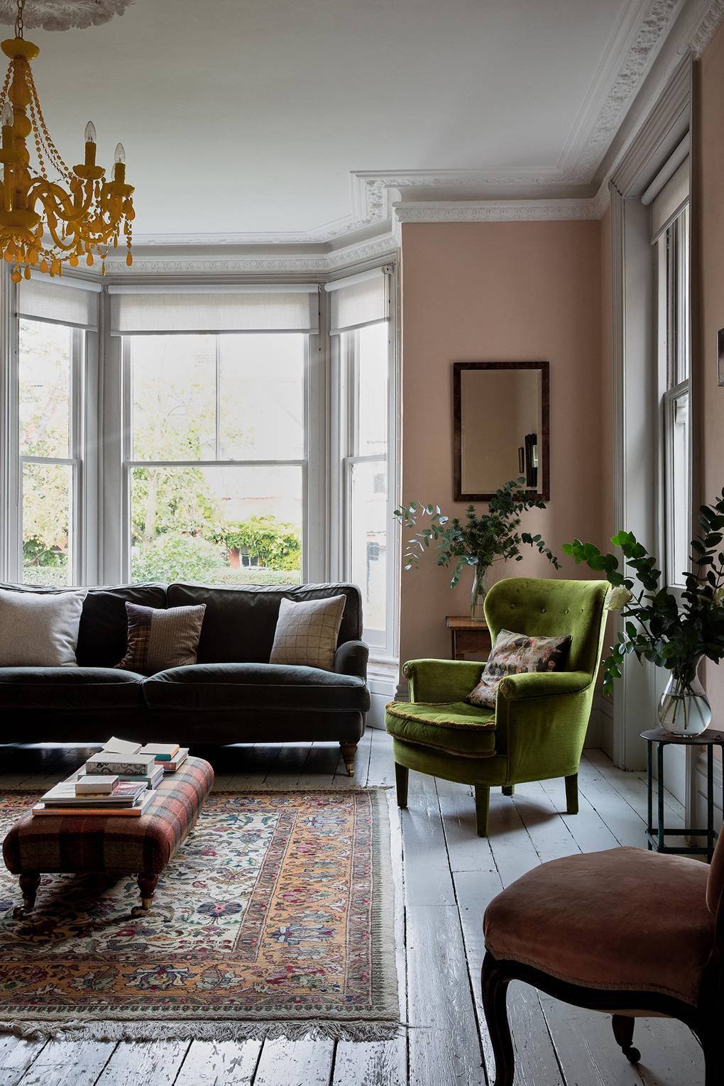  interior style, style, Victorian house, Victorian, London, inspiration, house, Mixing soft furnishing colours and styles, soft furnishings, rustic floorboards, built in bookcase, different size artworks, living room, large green vintage windows and 