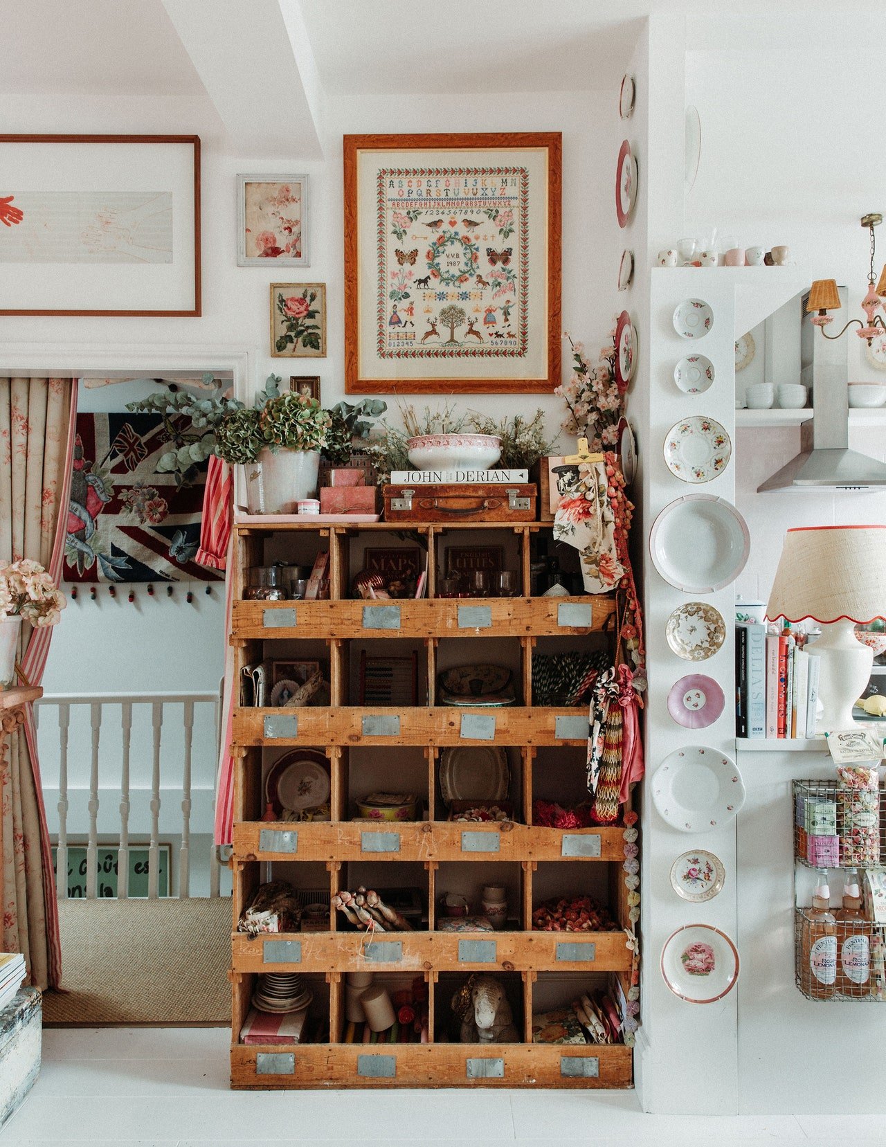   Maximalist, space, small space, doesn’t have to look messy, Designer, creative consultant,&nbsp;Violet Dent, pink, front room, stripes, flowers, petals, frames, gallery wall, big beautiful window, vintage dining table, framed art, lamp shades, kit