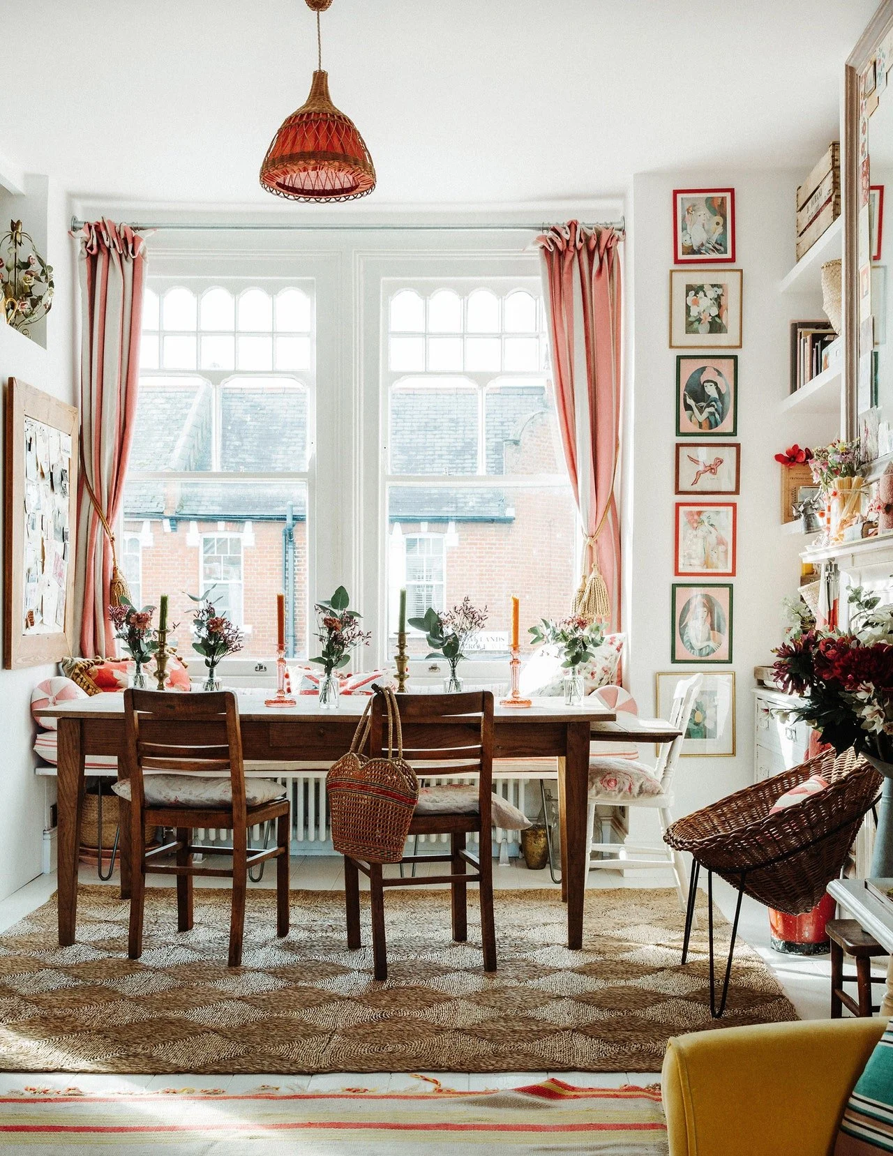    Maximalist, space, small space, doesn’t have to look messy, Designer, creative consultant,&nbsp;Violet Dent, pink, front room, stripes, flowers, petals, frames, gallery wall, big beautiful window, vintage dining table, framed art, lamp shades, kit