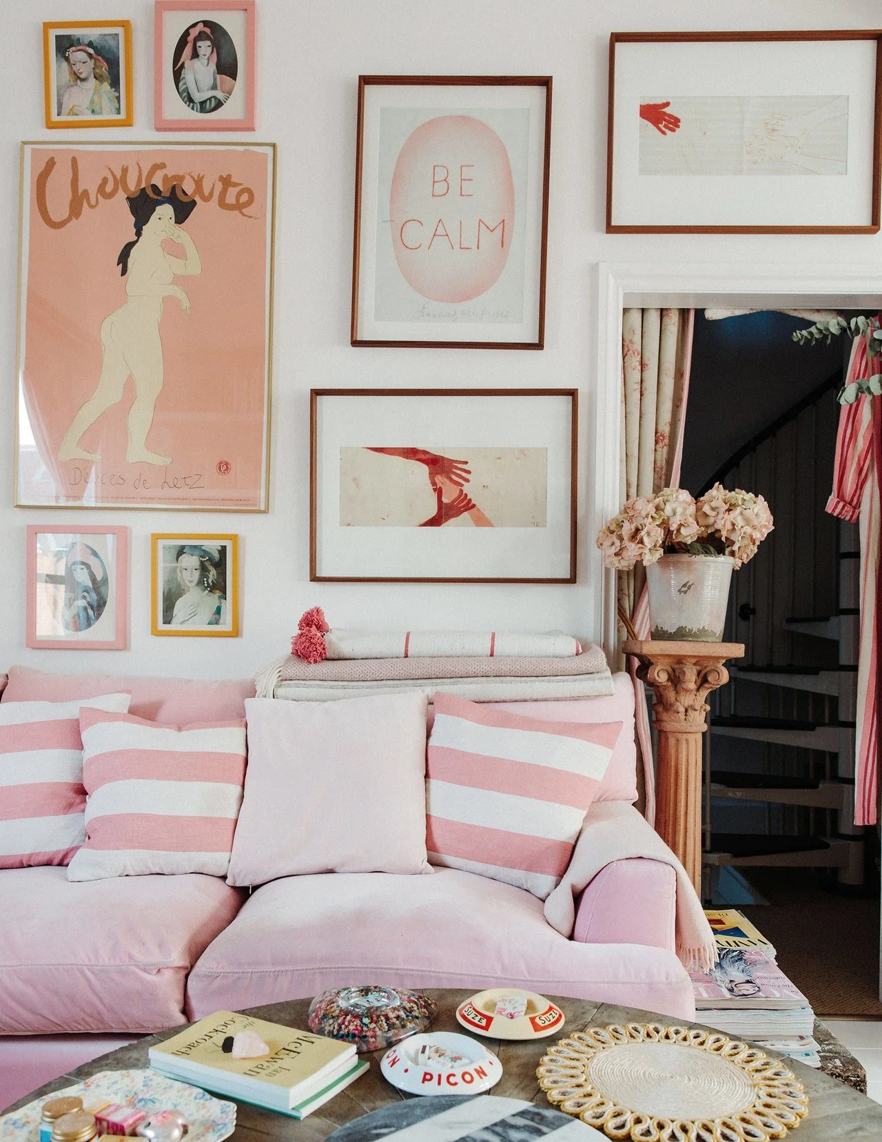    Maximalist, space, small space, doesn’t have to look messy, Designer, creative consultant,&nbsp;Violet Dent, pink, front room, stripes, flowers, petals, frames, gallery wall, big beautiful window, vintage dining table, framed art, lamp shades, kit