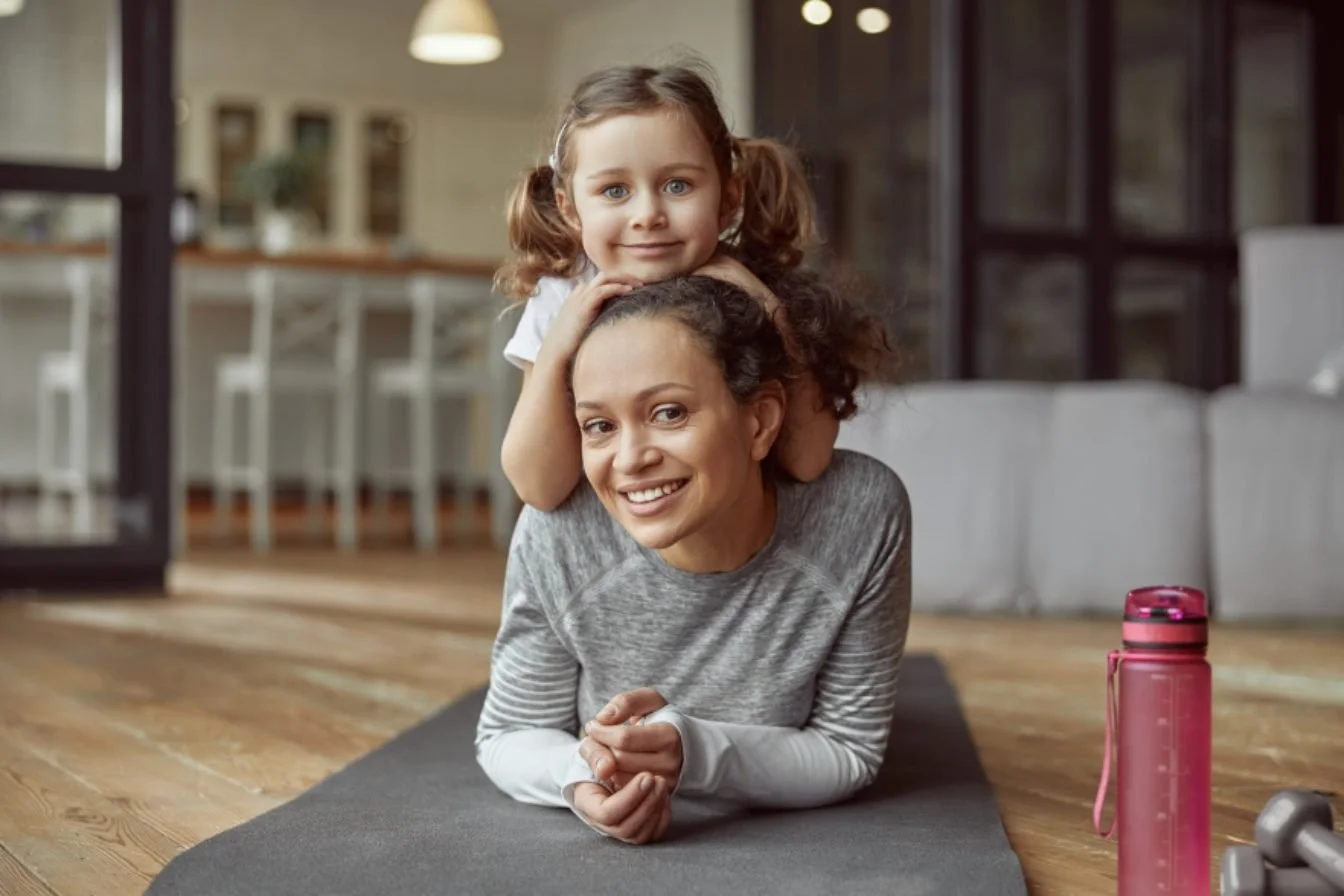 Mother and young daughter at home, a family built through embryo donation