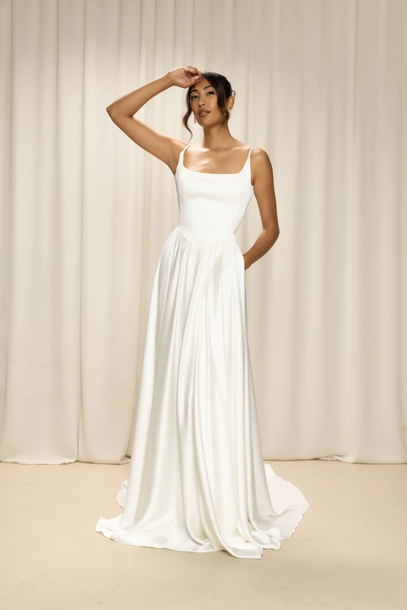 Amelie in liquid satin with a Basque waist
