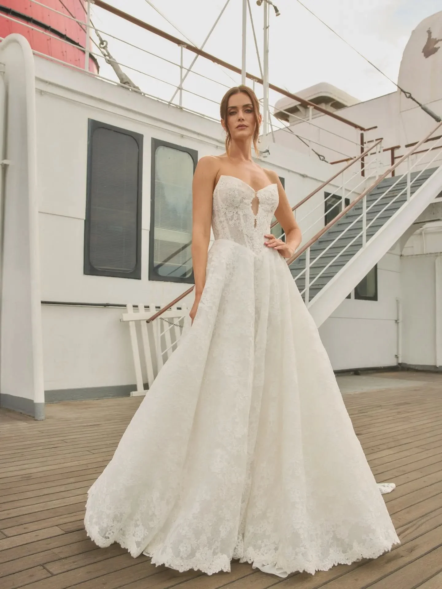 CARNEGIE // ⁠The sharp lines of this @tara_lauren cat-ear neckline lace gown and cinching basque is what modern fairytales are made of.  We loved her when we first saw her at NY fashion week at the end of last year, we love her still. ⁠
⁠