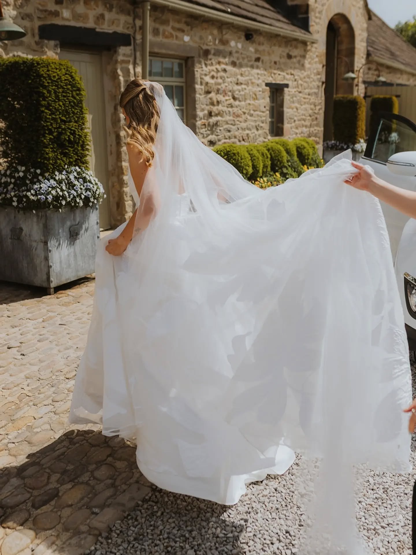 ABIE // Abie @abienewbitt wore Iris by @truvellebridal and had their wedding on a sunny day ⁠at @thetithebarn. ⁠
⁠
"From the moment I saw the dress online I knew it would be a strong contender, but nothing compared to when I tried it on for the 
