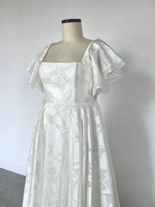 Lumi with flutter sleeves
