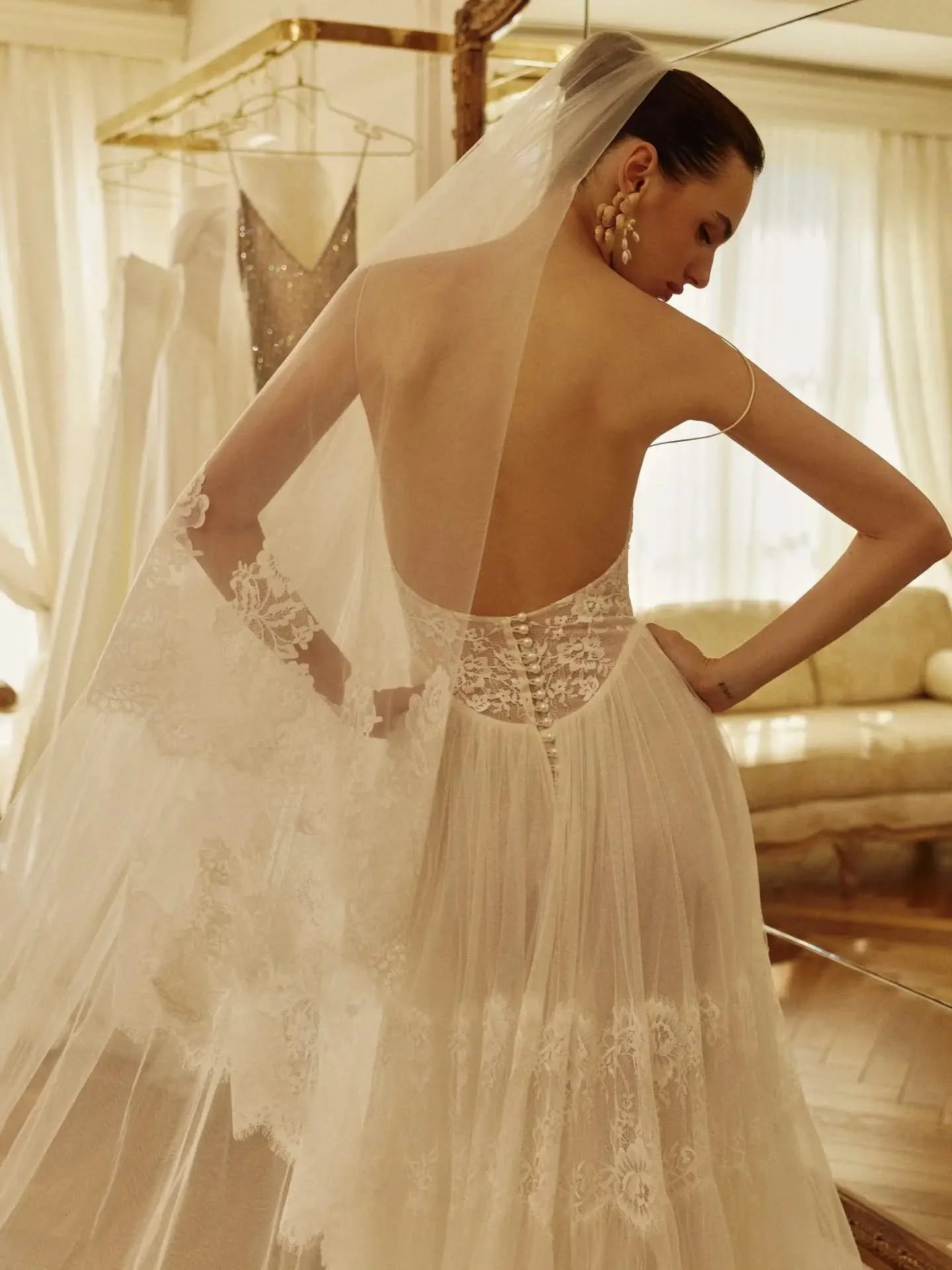 LUMIERE // Newness from the brand new and much anticipated @_houseofflora_ collection. Whispy lace and tulle, vintage basque waist and a delicate ballerina touch. Oh and THAT back.

She's ready for you to fall in love with at the Heart Aflutter Studi
