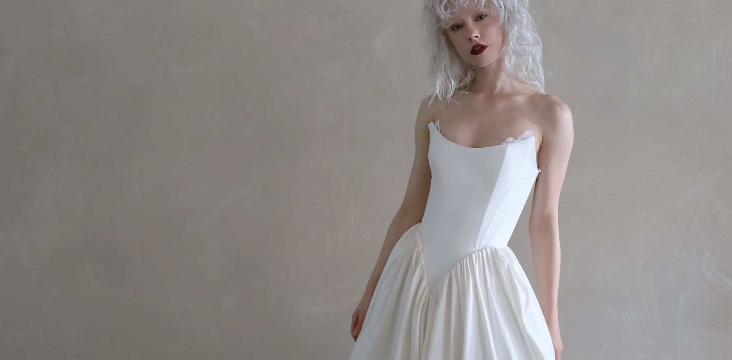 Hedy Basque waist wedding dress by Tara La Tour