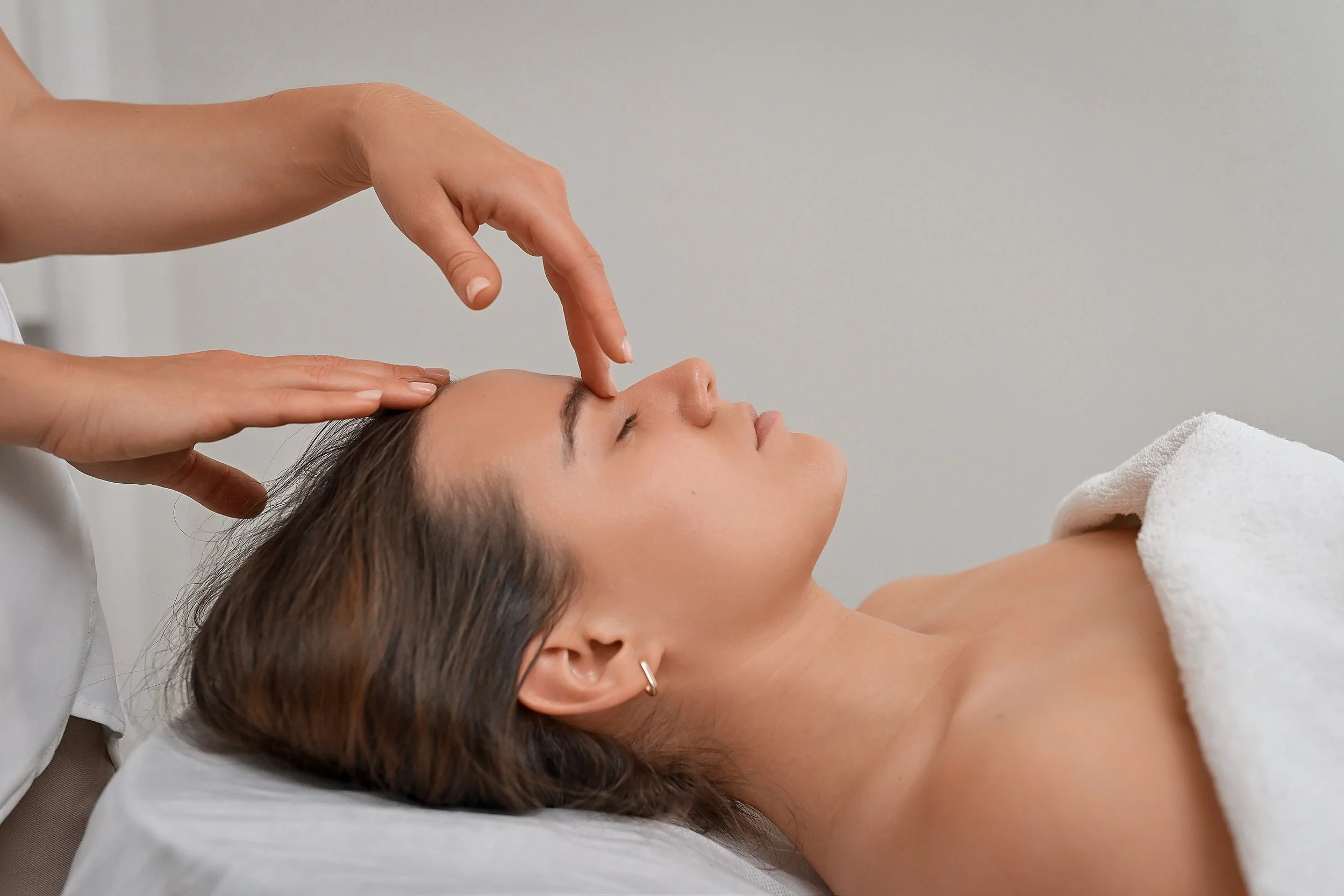 Client receiving a customized facial treatment at AskCares, a luxury skincare studio in Studio City specializing in anti-aging and skin rejuvenation.