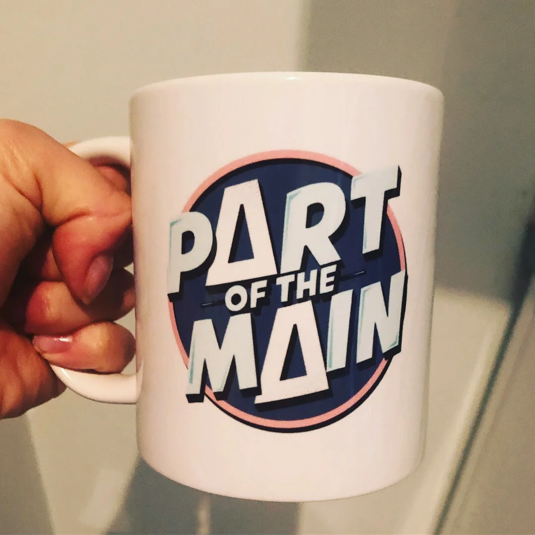  A mug with the POTM logo that Jessica, the Squirrel Plays director, bought for producer Olivia on her birthday. 