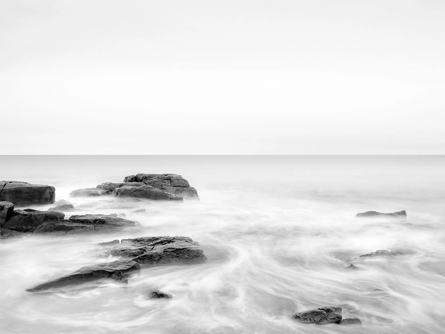 Solitude: Notes on a Long Exposure of a Quiet Coastline. An open-edition print from the continued Slow Water series.