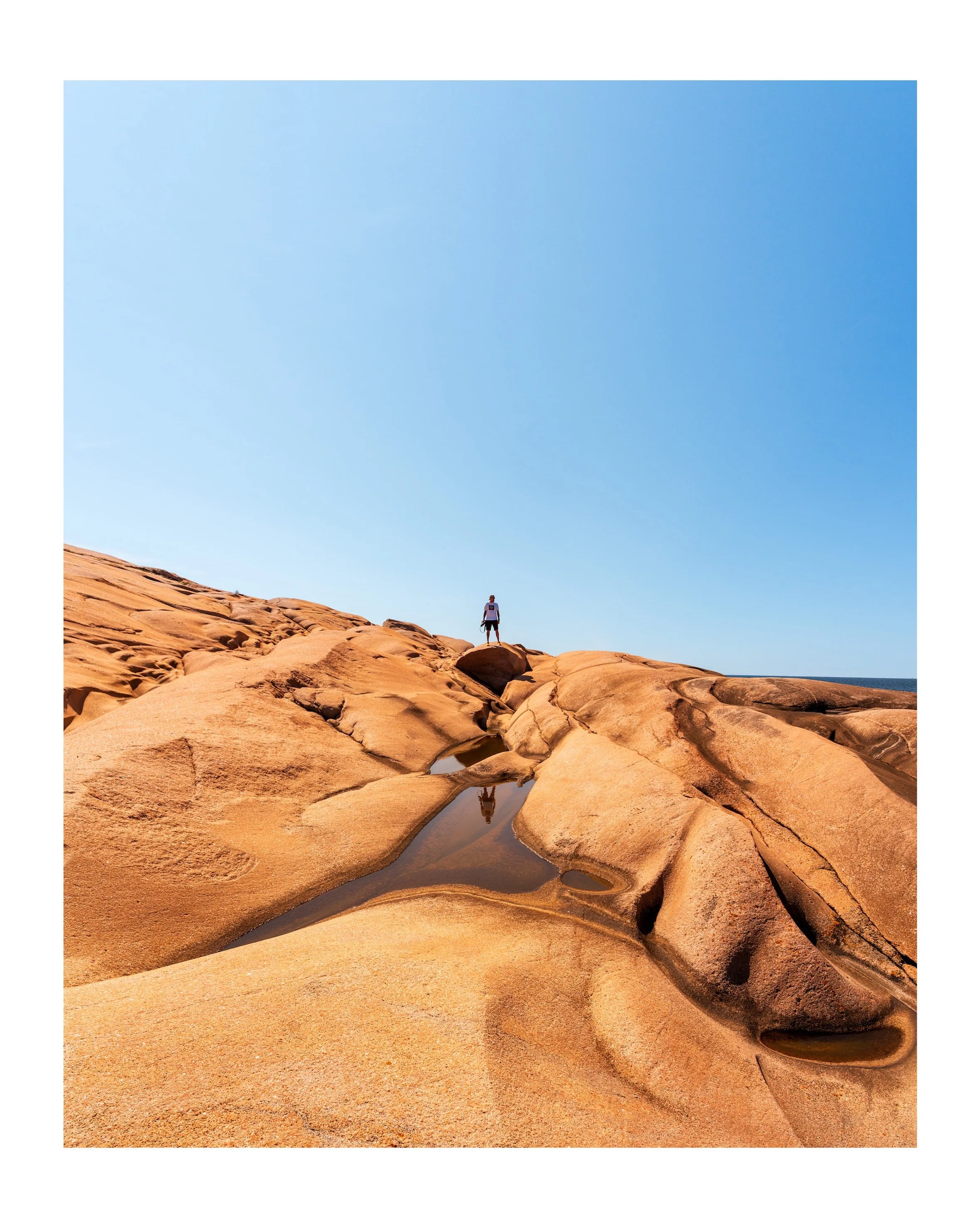 Sculpted by Time &mdash; with a little sense of scale.

It&rsquo;s easy to lose perspective when photographing the shapes and details of the rocks at Ramsviklandet.

With @stianekrephotography standing out on the cliffs, you really get a sense of jus